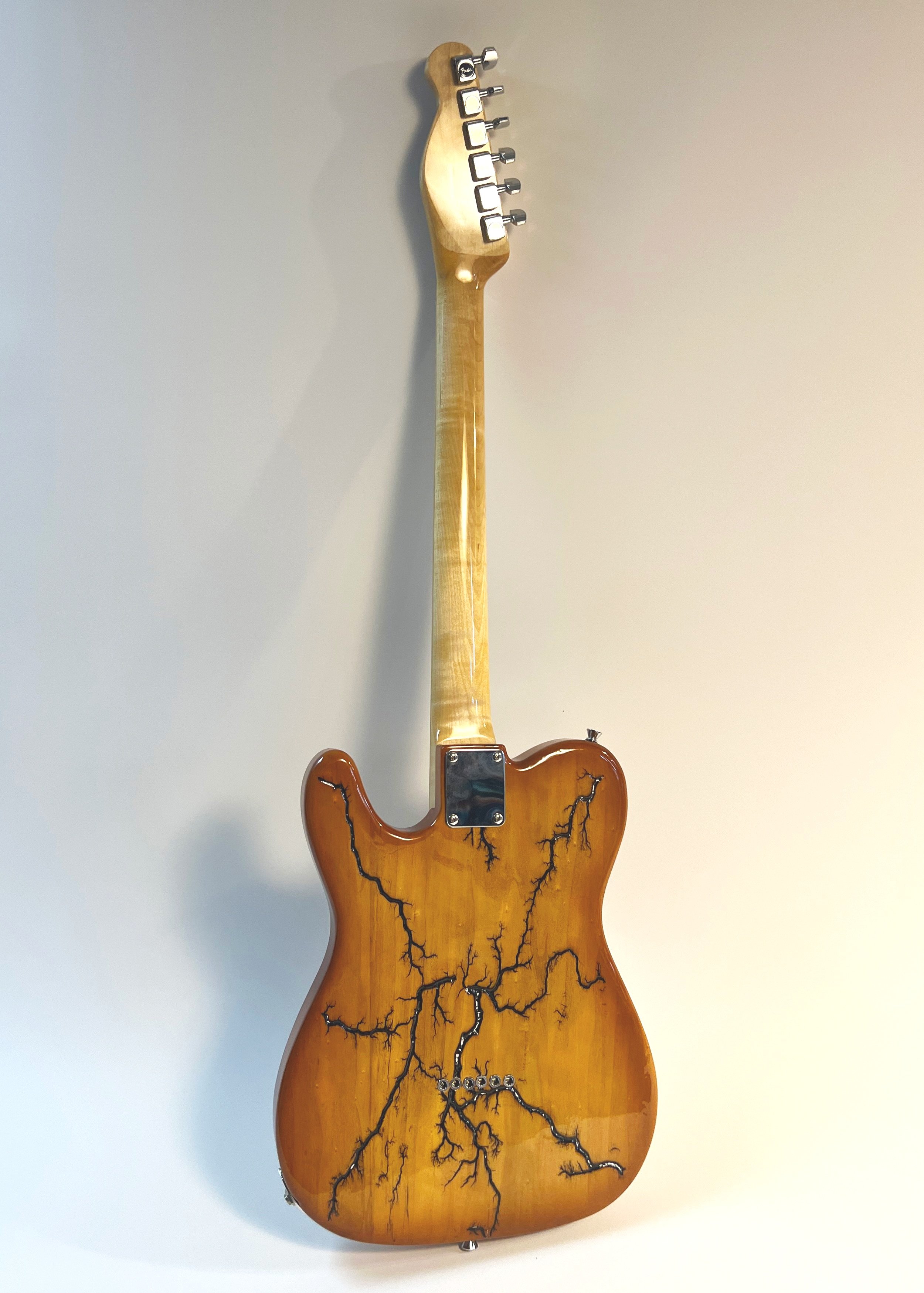 back+of+gold+guitar+w+bG.jpg