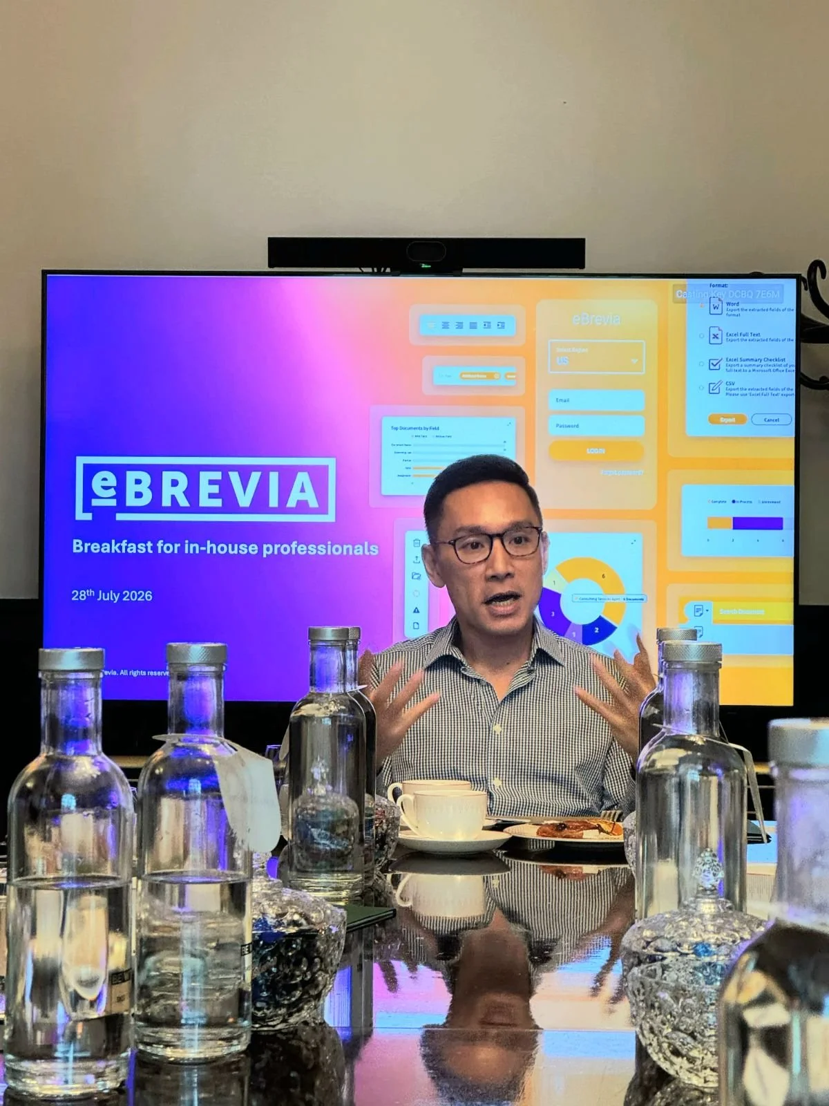 eBrevia CEO Adam Nguyen addresses senior contract management executives in London.