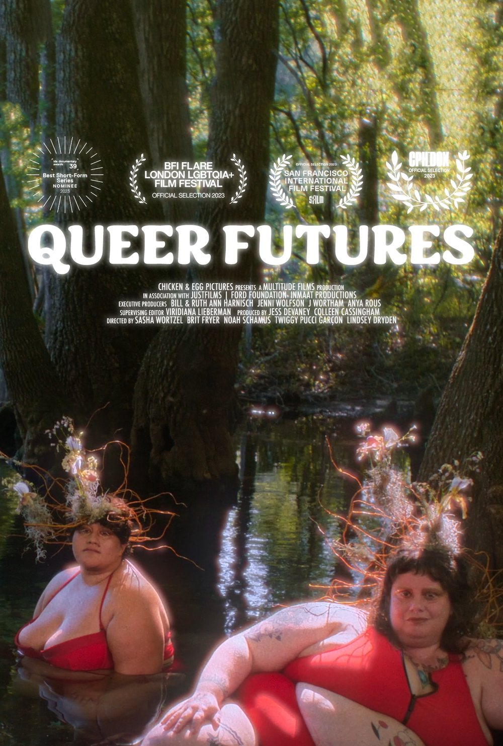 Queer Futures film poster with a photograph of two people in a reflective pool wearing decorative headpieces and red swimsuits on their ample bodies. There are four film festival laurels above the film title and credits.