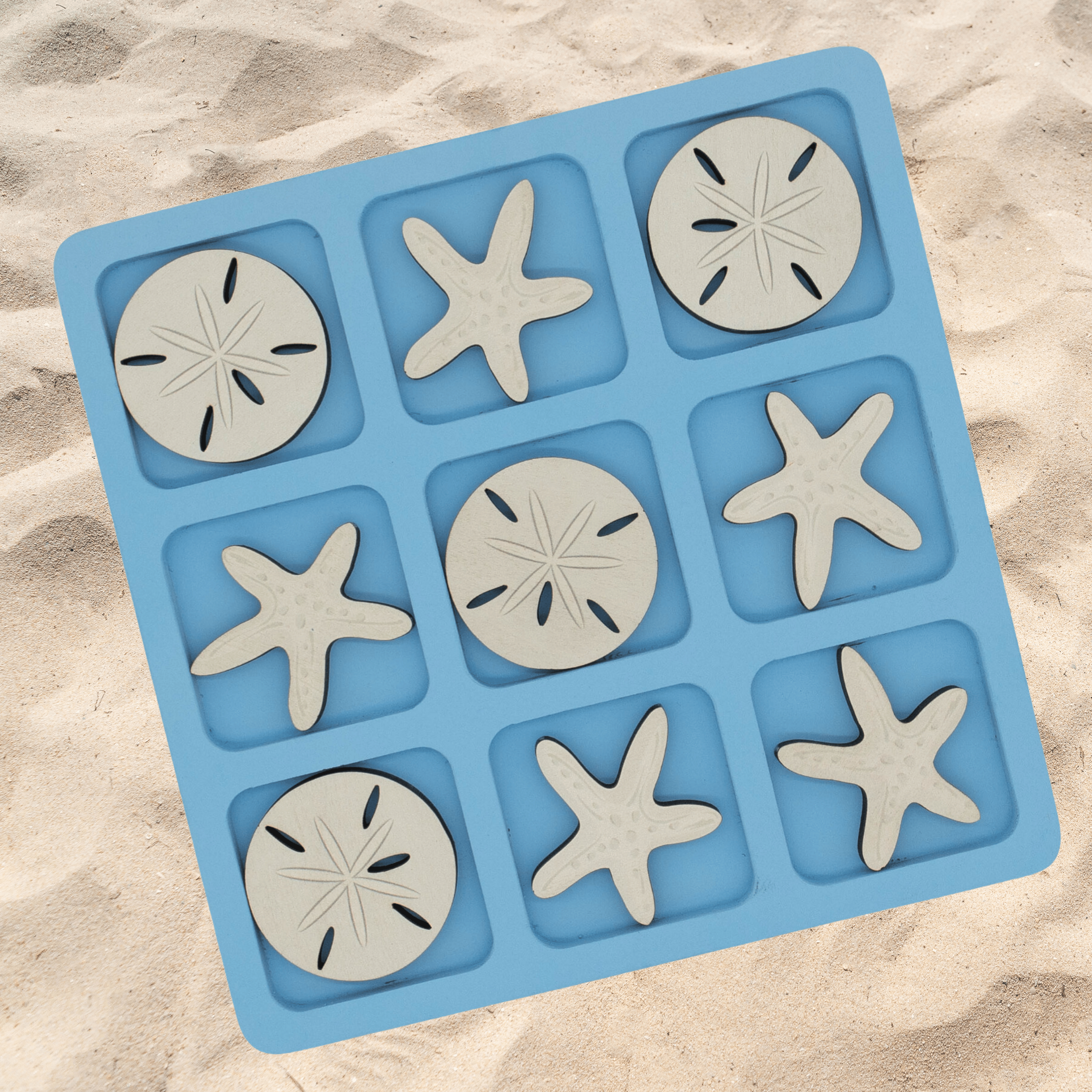 woobli-seastarvssanddollar-B0D9N2WYVM-beach-background.png