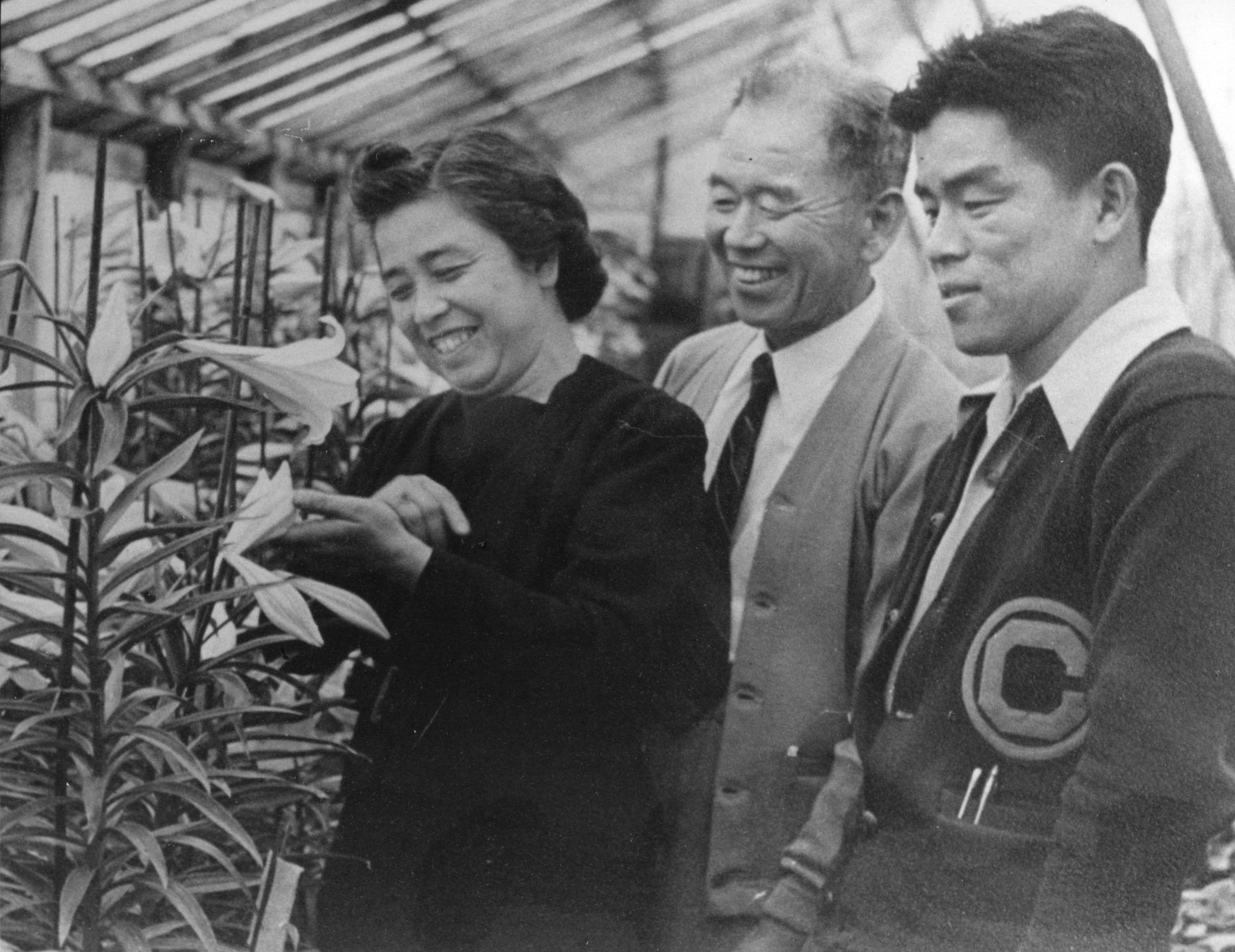 SECOND PRIZE
Wendy Adachi's circa 1938 photo of her grandparents, Isaburo and Wakako Adachi, and her uncle Tosh Adachi, looking at Easter lilies in their greenhouse at the Adachi Nursery located on San Pablo Avenue in El Cerrito.
