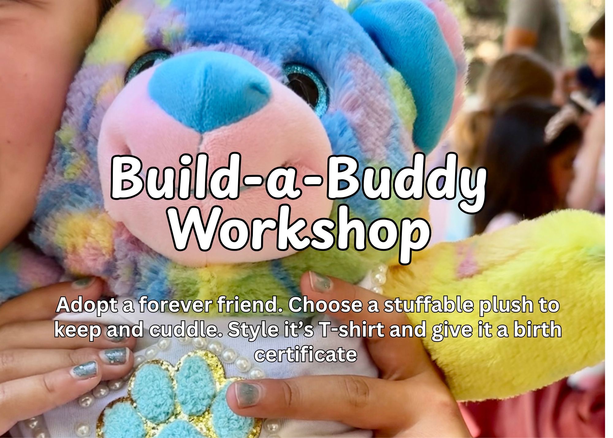 Colorful stuffed animal bear wearing a white T-shirt with an embroidered design, surrounded by a vibrant background with pink and green tiles.