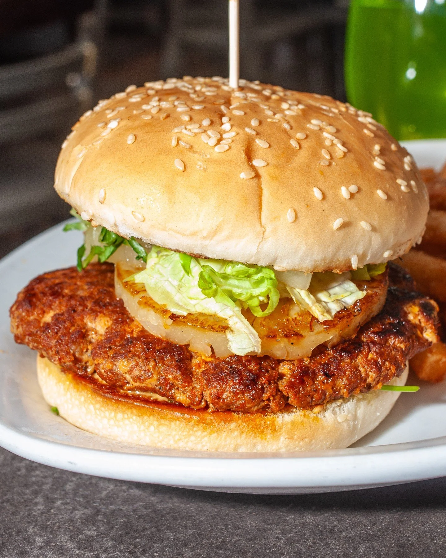 The Big Kahuna’s calling, dude!
Marinated ground pork patty, grilled pineapple, onion, cilantro, lettuce, and a kick of Cholula aioli. That’s one tasty burger. 🍍🍔