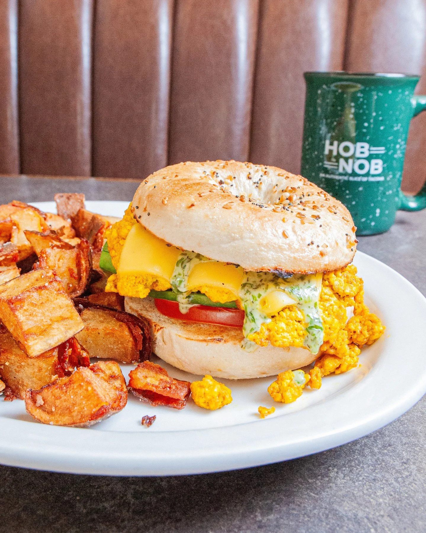Our new Vegan Bagel sando doesn't skimp on flavor or heartiness. Come get satisfied with Chao cheese, tomato, avocado, tofu egg-stitute and green goddess dressing on your choice of plain or everything bagel. Add vegan sausage if you're feeling that e