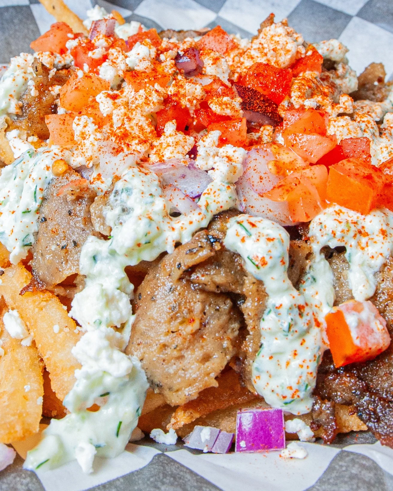 Sometimes you just need a big ole' pile of deliciousness for dinner 🍽️ 👀 Here are a couple of our new options to satisfy the craving -⁠
⁠
🍅 Greek Fries 🍟⁠
French fries topped with feta cheese, red onion, tomato, and tzatziki with a sprinkle of pa