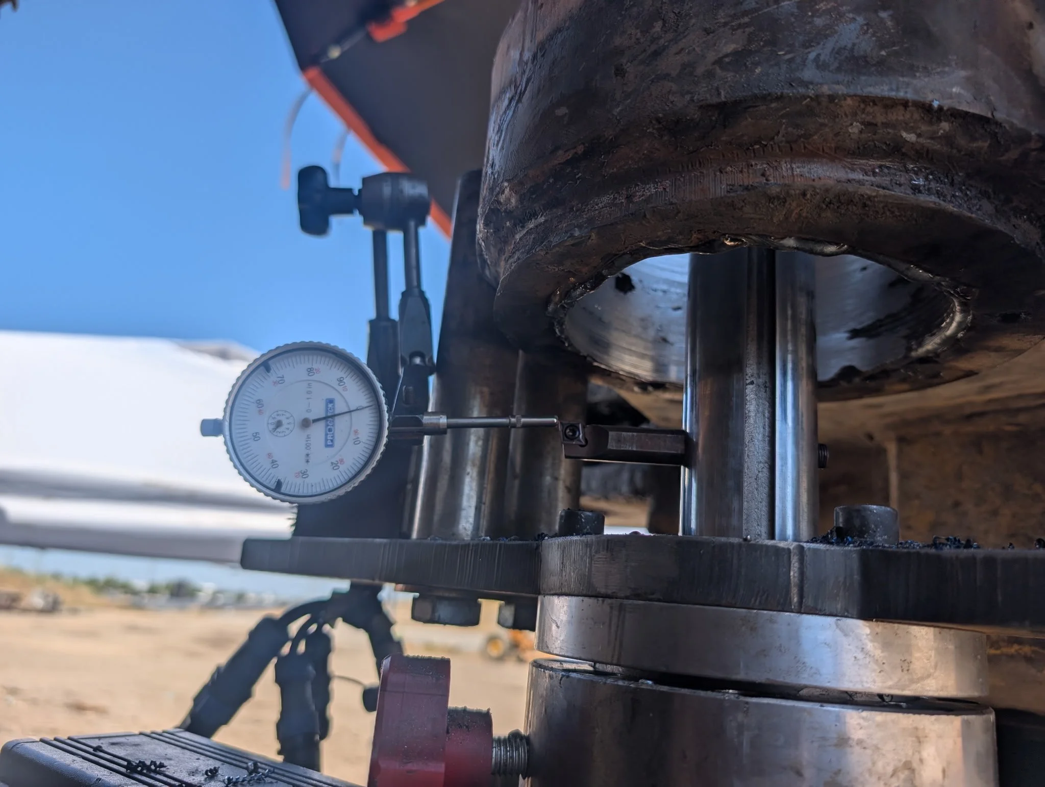 Precision line-boring in the field with gauges and stabilizing equipment in central California