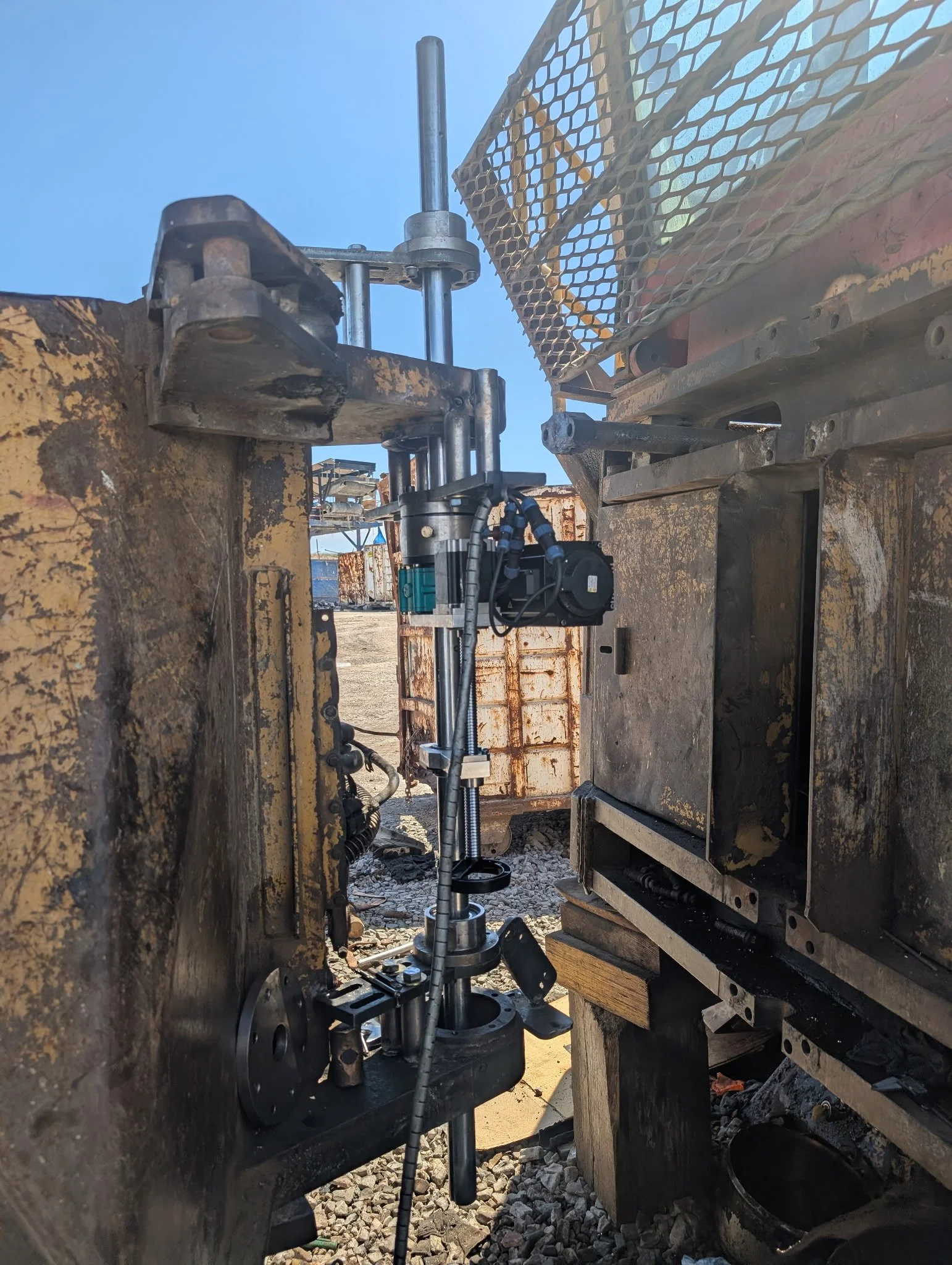 A hitch pin bore being repaired on-site with line-boring equipment