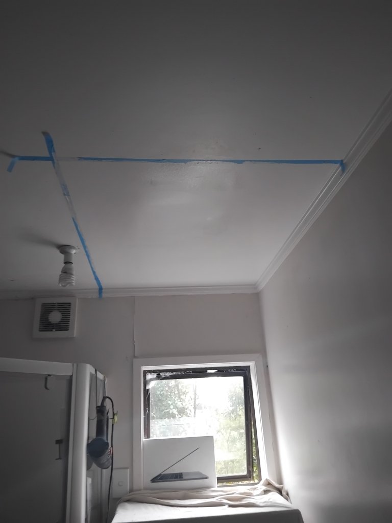 After photo of ceiling repairs. Gib replacement, plastering and patch paint to minimize cost to property owner