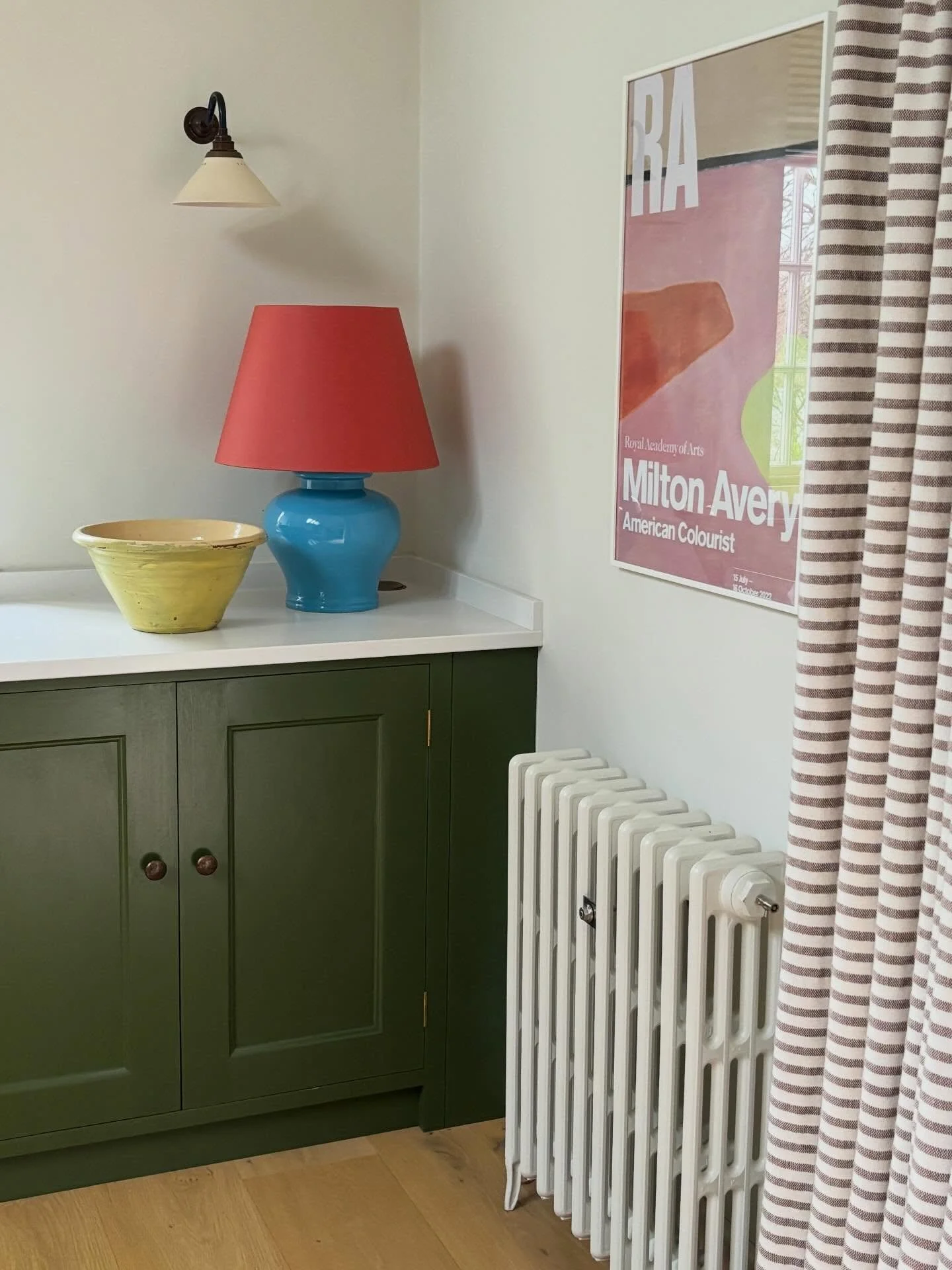 This yellow bowl, bought cheaply at Bridport market, sings and zings happily in its new home next to a glazed cerulean blue lamp and red card shade in this corner of Amy&rsquo;s Dorset kitchen. All the primaries! 
#primarycolours #kitchen #vintagecer