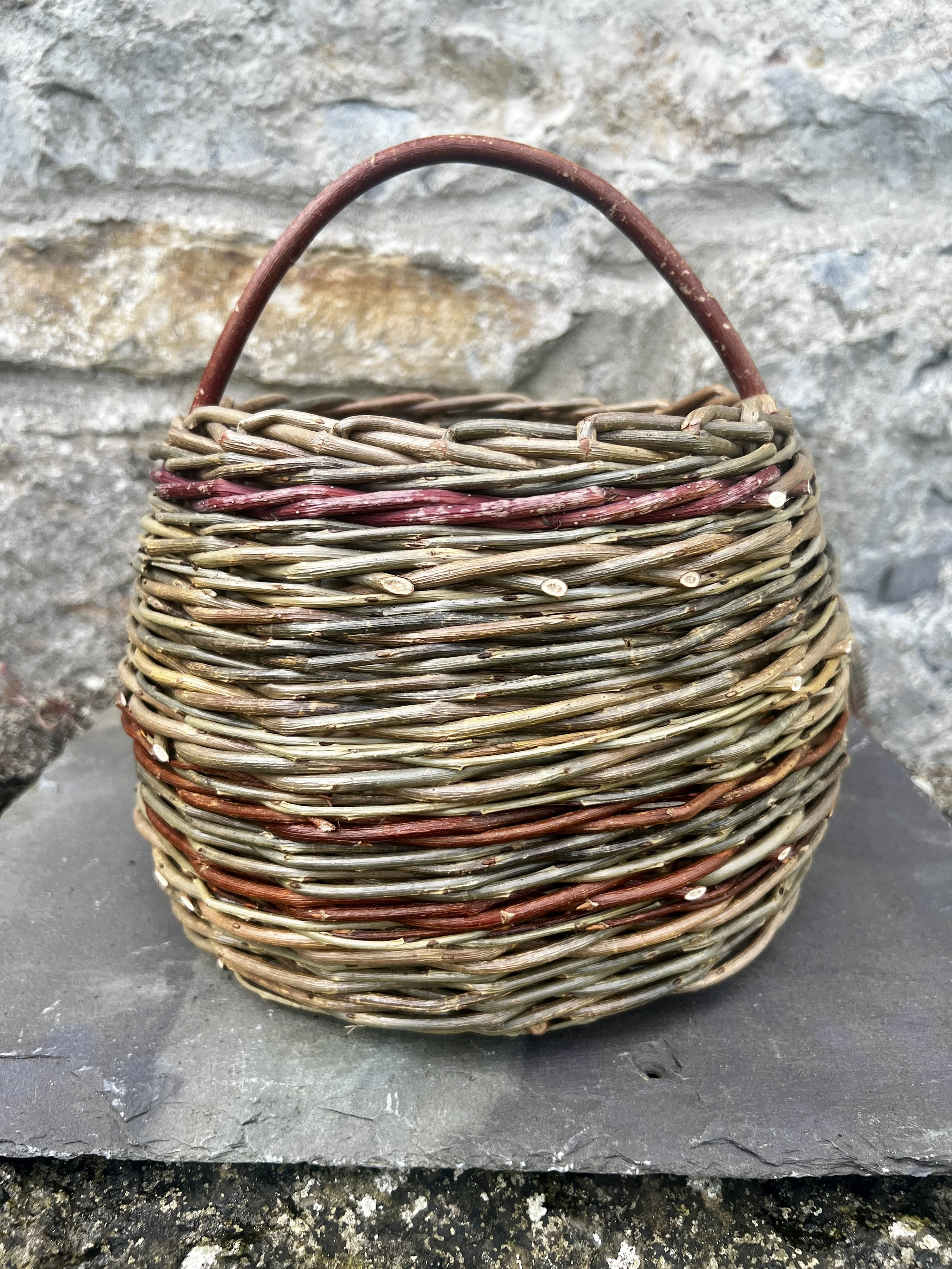 Small round hand woven willow berry basket