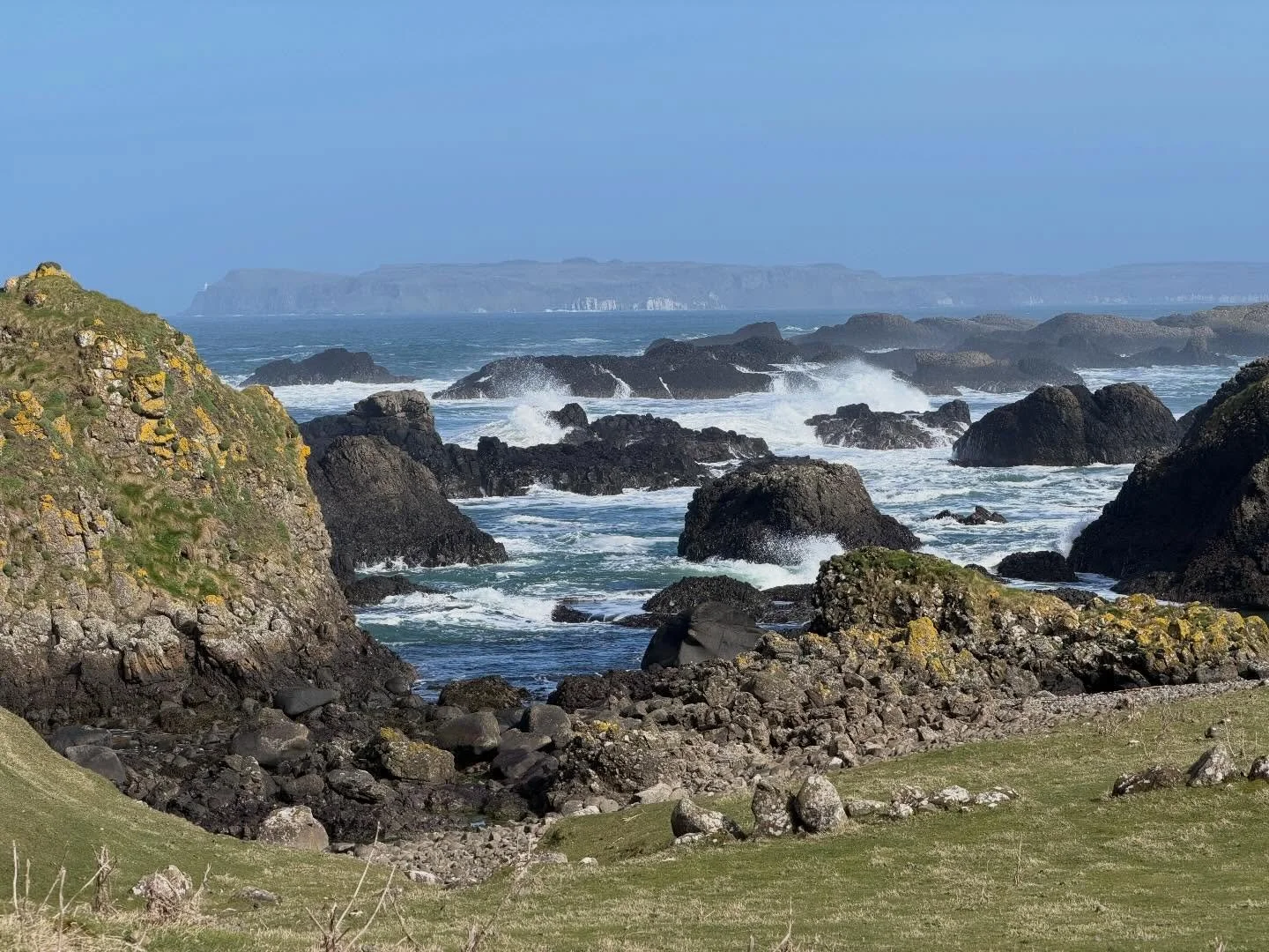 The walk from Whitepark Bay to Ballintoy Harbour ( at low tide). Great views of Basalt Rocks and white seas along the way. Paths available the whole way.😀