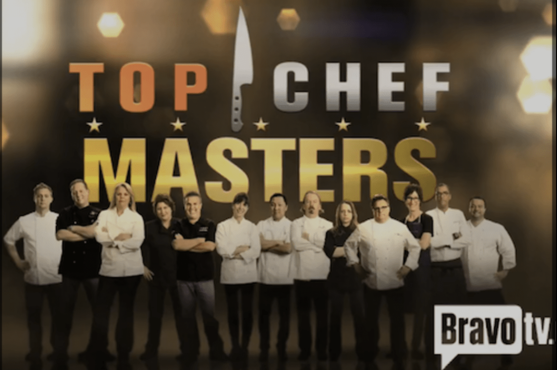Group photo of celebrity chefs standing in front of a backdrop with the text "Top Chef Masters" and the Bravo TV logo.