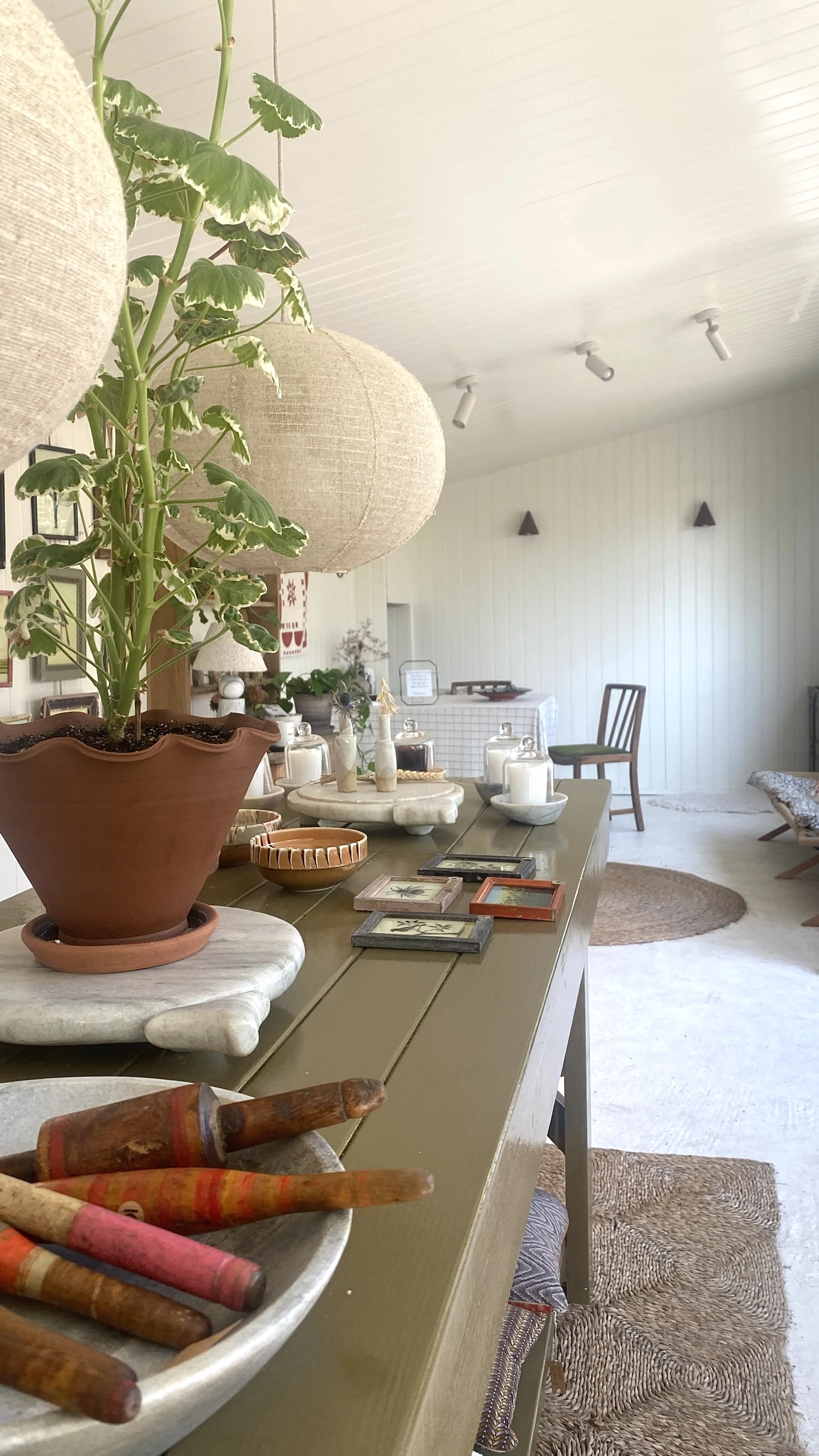 Vintage jars, vases, stools. Antique artwork. Collectible decor. Small brands. Independent shopping East Sussex. Homewares store. Interior design by Heath and Down. Tongue and groove, shiplap walls, bespoke lighting.