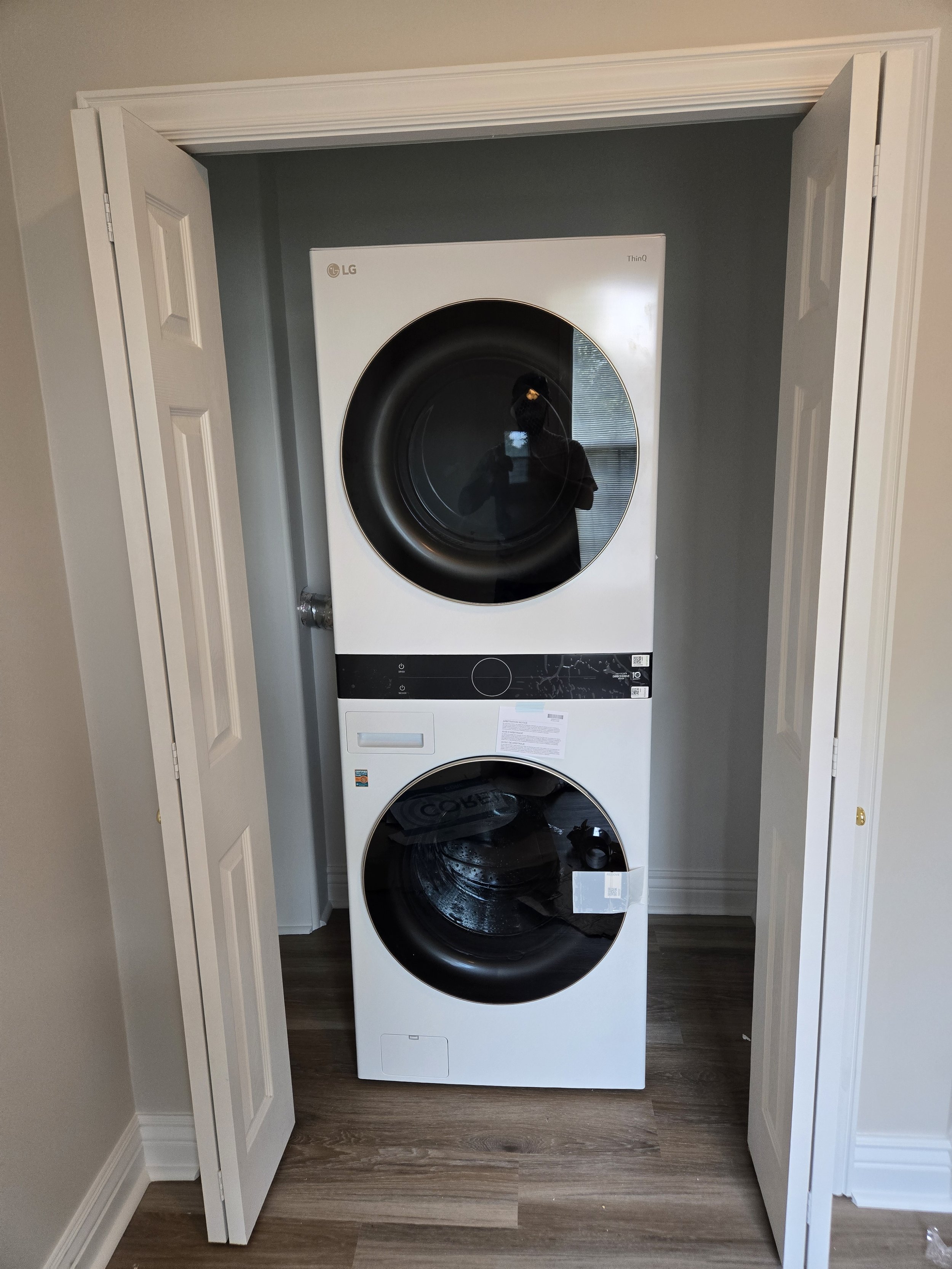 We expanded the old closet to accommodate a washer and dryer, complete with new water supply lines, drainage, a 110V outlet, and a 220V outlet. And to top it off, we installed a brand-new floor!