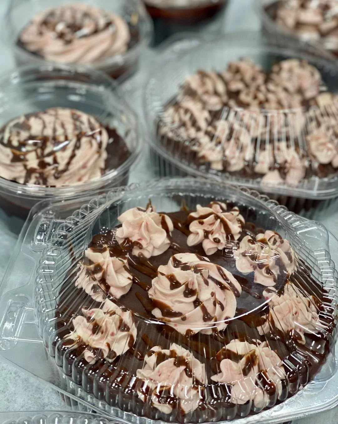 Delicious treats in our dessert fridge! We have Chocolate Tortes with Raspberry Cream and Key Lime Pies!