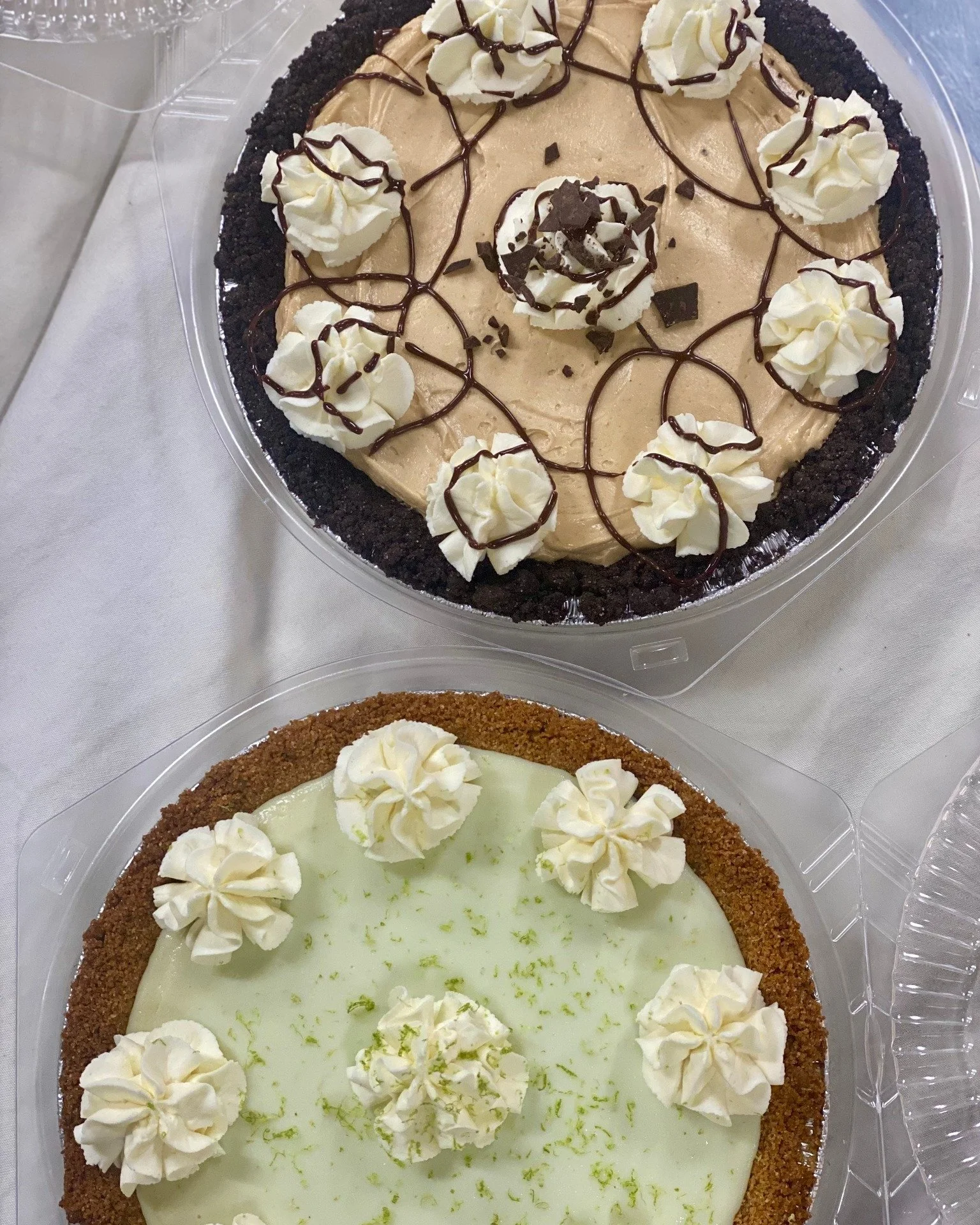 New pies in the fridge! We have Peanut Butter Pie and Key Lime Pie, perfect for dessert.