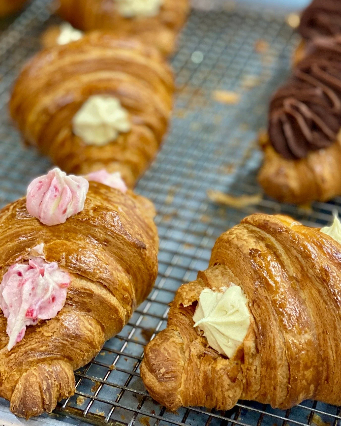 Plenty of croissant options on a Saturday here at the bakery! We have Cream Filled Croissants, Nutella Cruffins, and Plain Croissants!