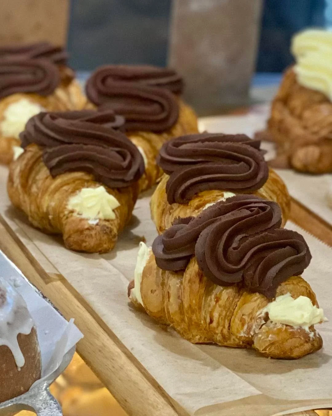 Lots of variety in the bakery case today! We have Boston Cream Croissants, Raspberry Croissants and Key Lime Tarts.