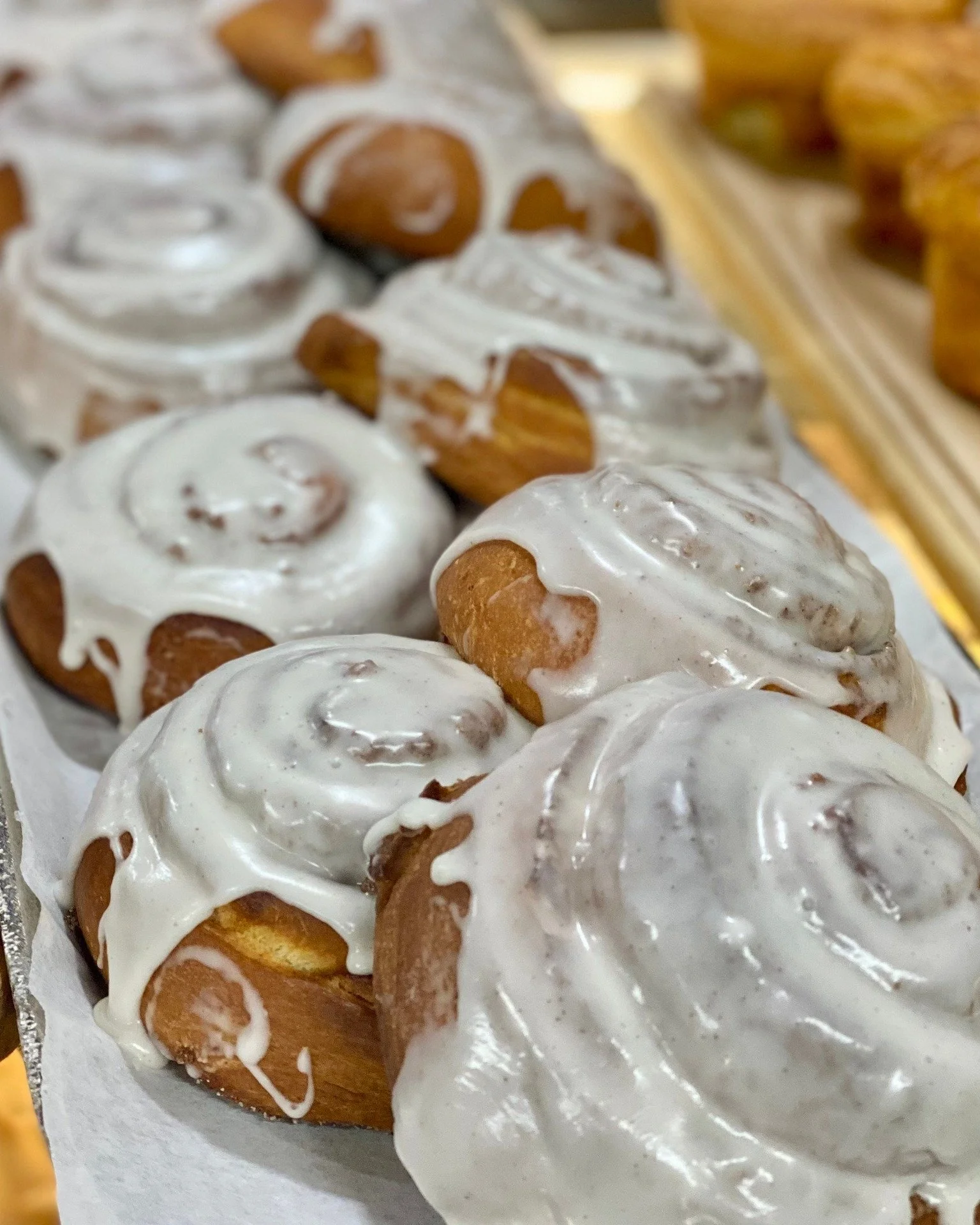 Lots of delicious baked goods this weekend! We've got Cinnamon Brioche Buns, Raspberry Almond Tarts, and Pumpkin Cheesecakes (in the dessert fridge).