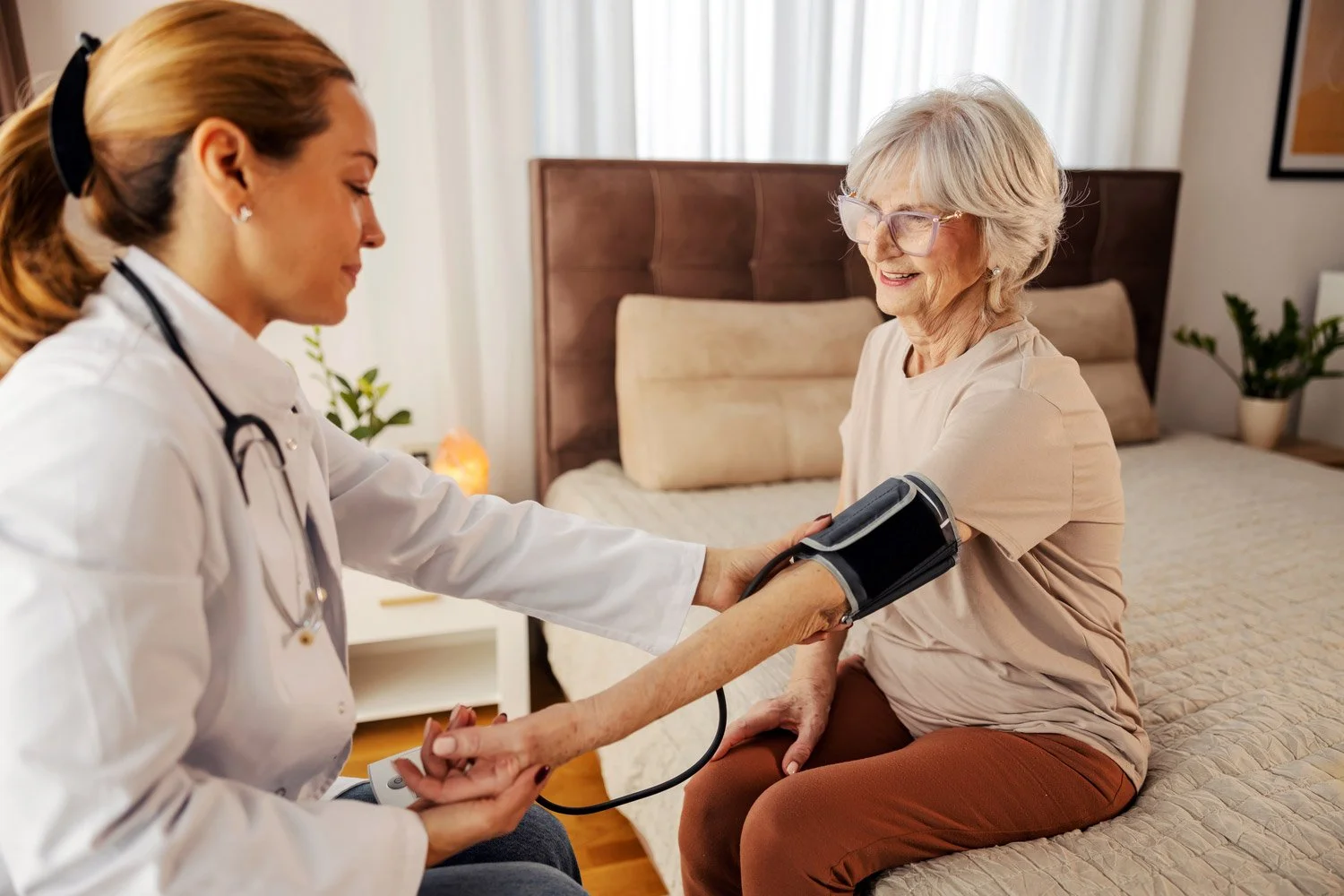 Home GP Appointment Doctor looking after patient