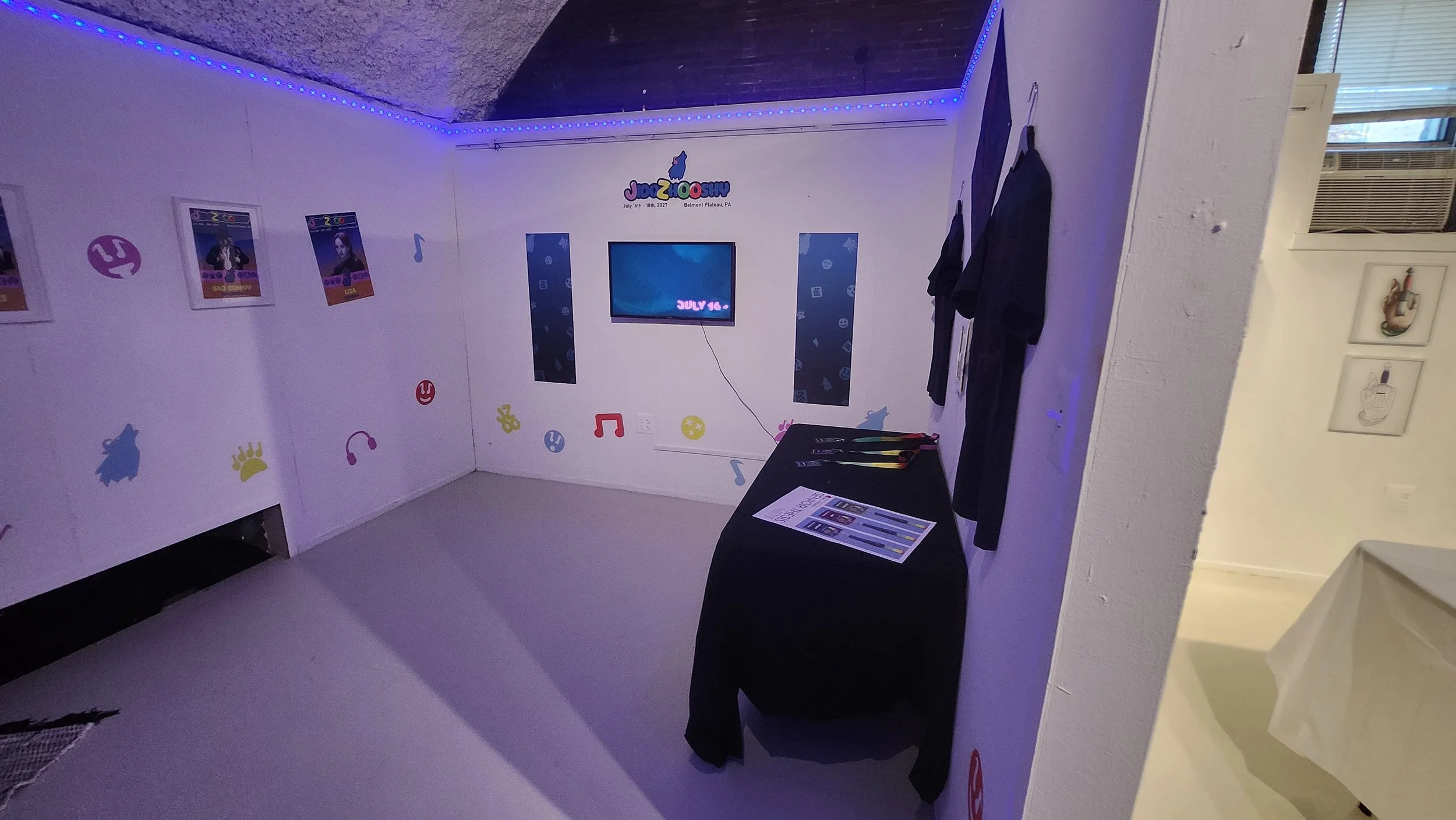 Lights on entrance with stage design and apparel tabel