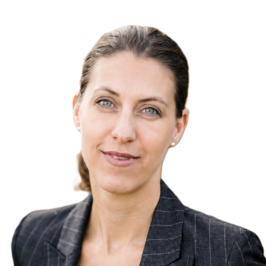 Portrait of a woman with brown hair in a professional outfit, smiling softly.