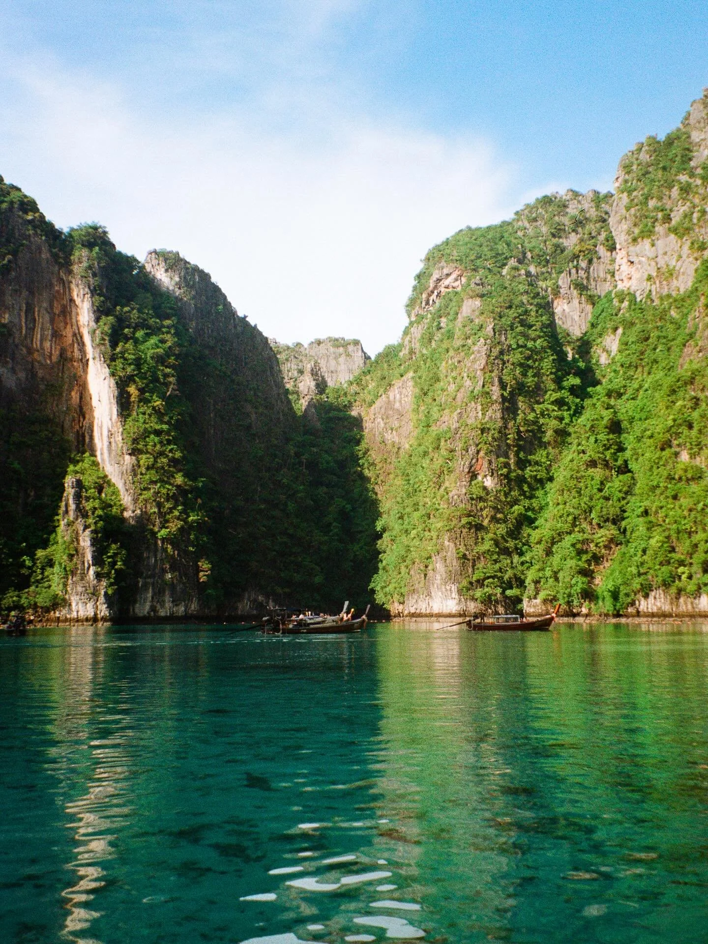 was packing for another trip 2 weeks ago and found a missing roll from a trip to thailand over summer. 

these are all from when I took a boat at sunrise to the phi phi islands :))