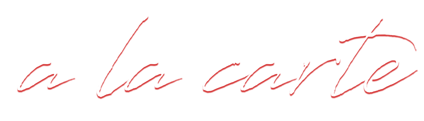 The text 'a la carte' written in cursive script with a black background.