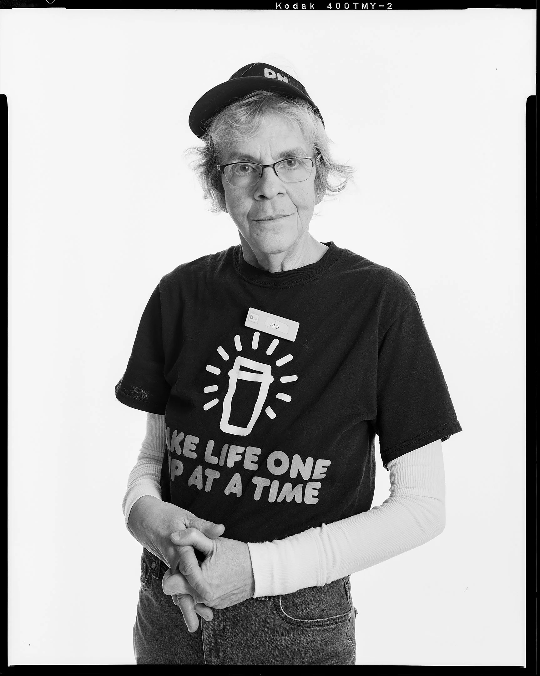 Studio portrait of Dunkin Donuts employee. 