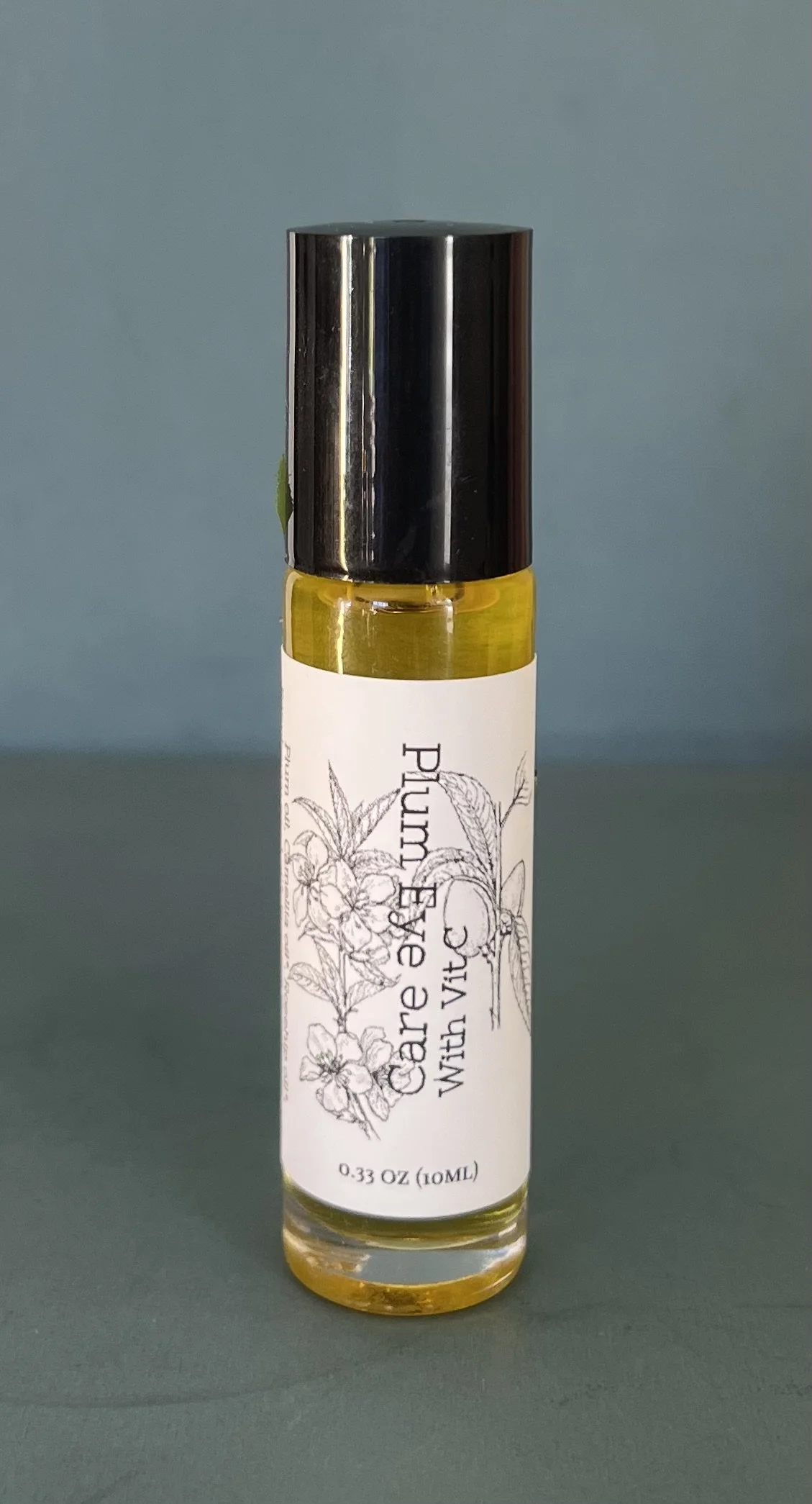 Plum eye serum roller bottle.jpeg