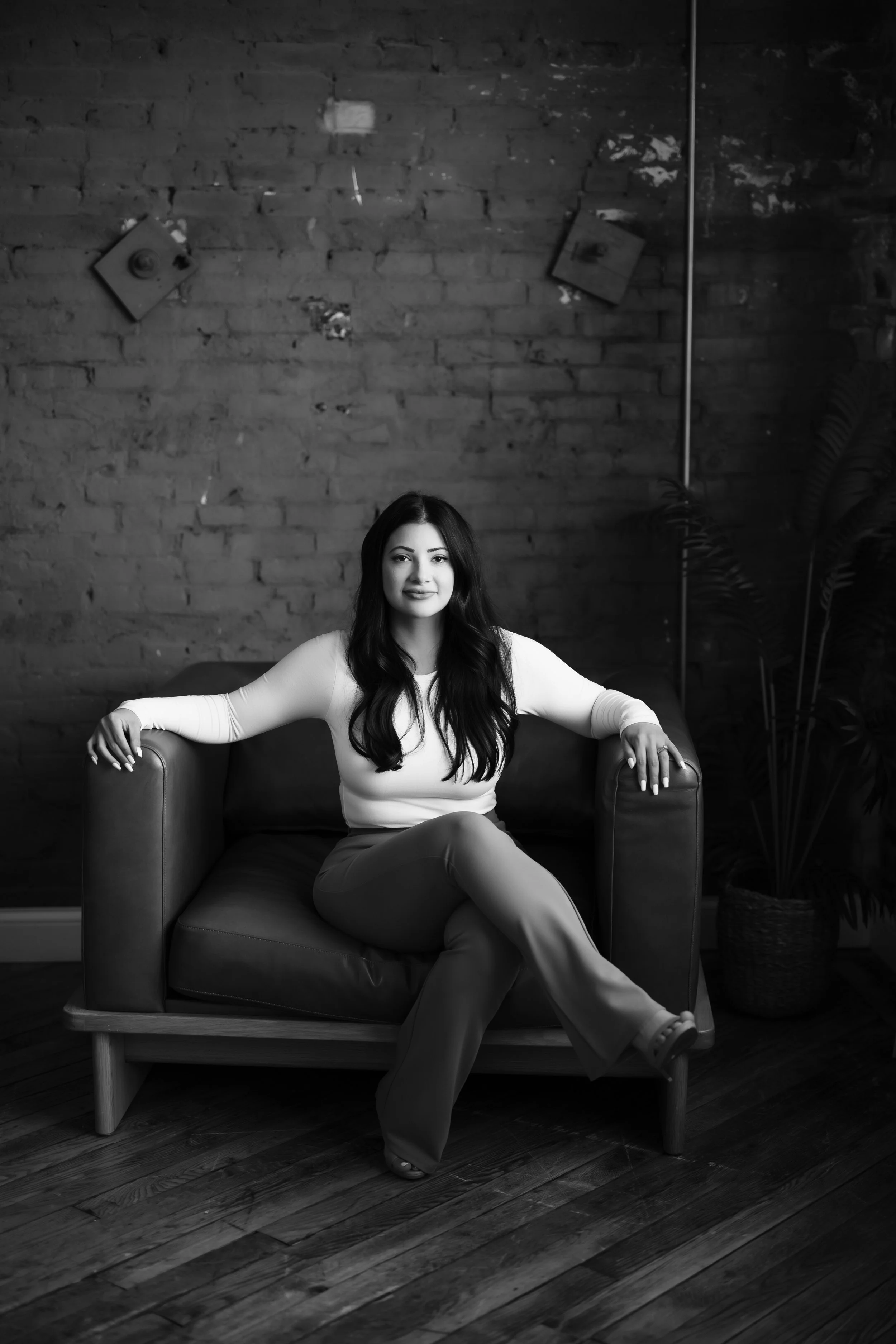 Creative branding portrait of a Lafayette-based designer in their studio, surrounded by design materials and tools.
