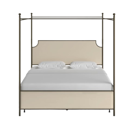 A bed with a beige headboard and bedding, framed by a metal four-poster bed with colorful panels on the sides.