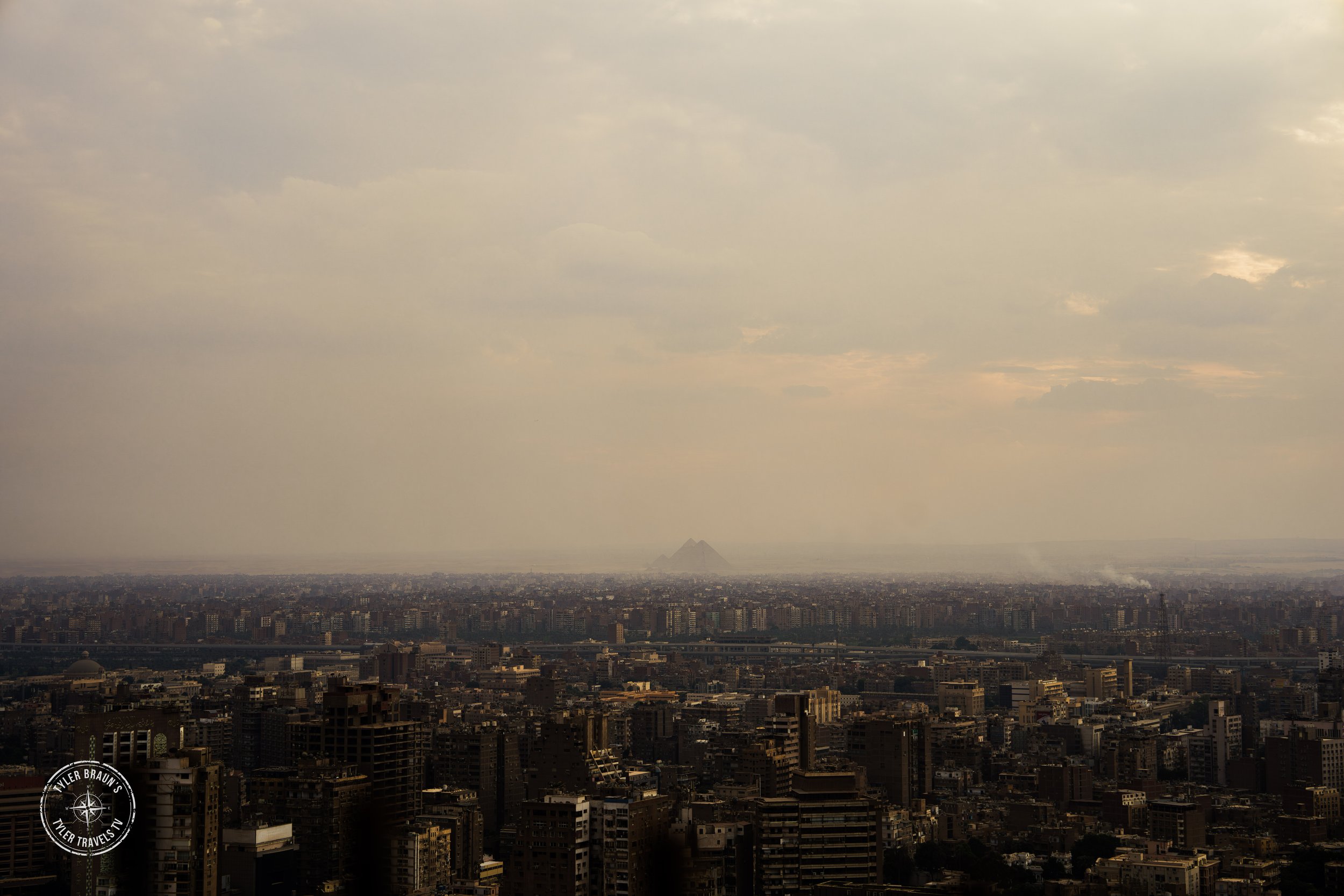 Image of the Cairo Skyline with the Pyramids in the background