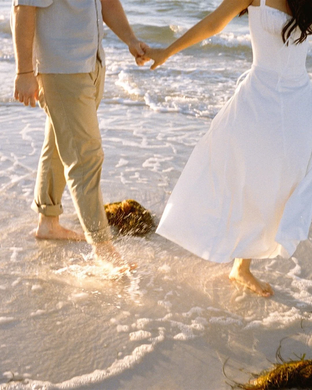 Beach engagement session on film at Bean Point, the kind of light that feels like it was made just for love stories. The wind tangled their hair, the tide kept pulling closer, and every frame on Kodak felt like something out of a daydream. Film slows
