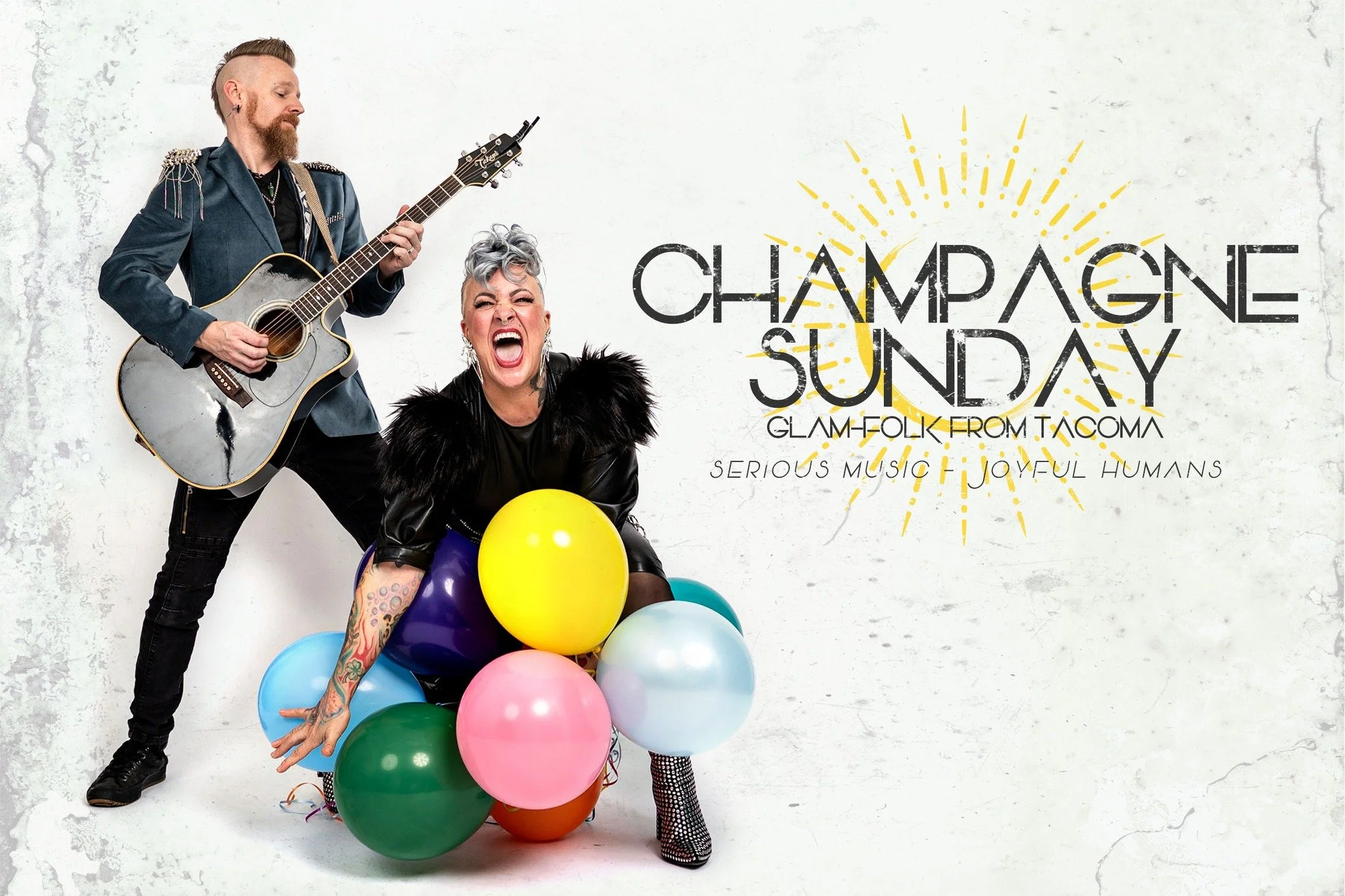 Serious music. Joyful humans. 

Champagne Sunday, the Tacoma-based glam-folk duo of married partners Jessi and Jared Fredeen, brings 15 years of shared life, rich vocal harmony, and heartfelt storytelling to the stage this Saturday.

Don&rsquo;t miss