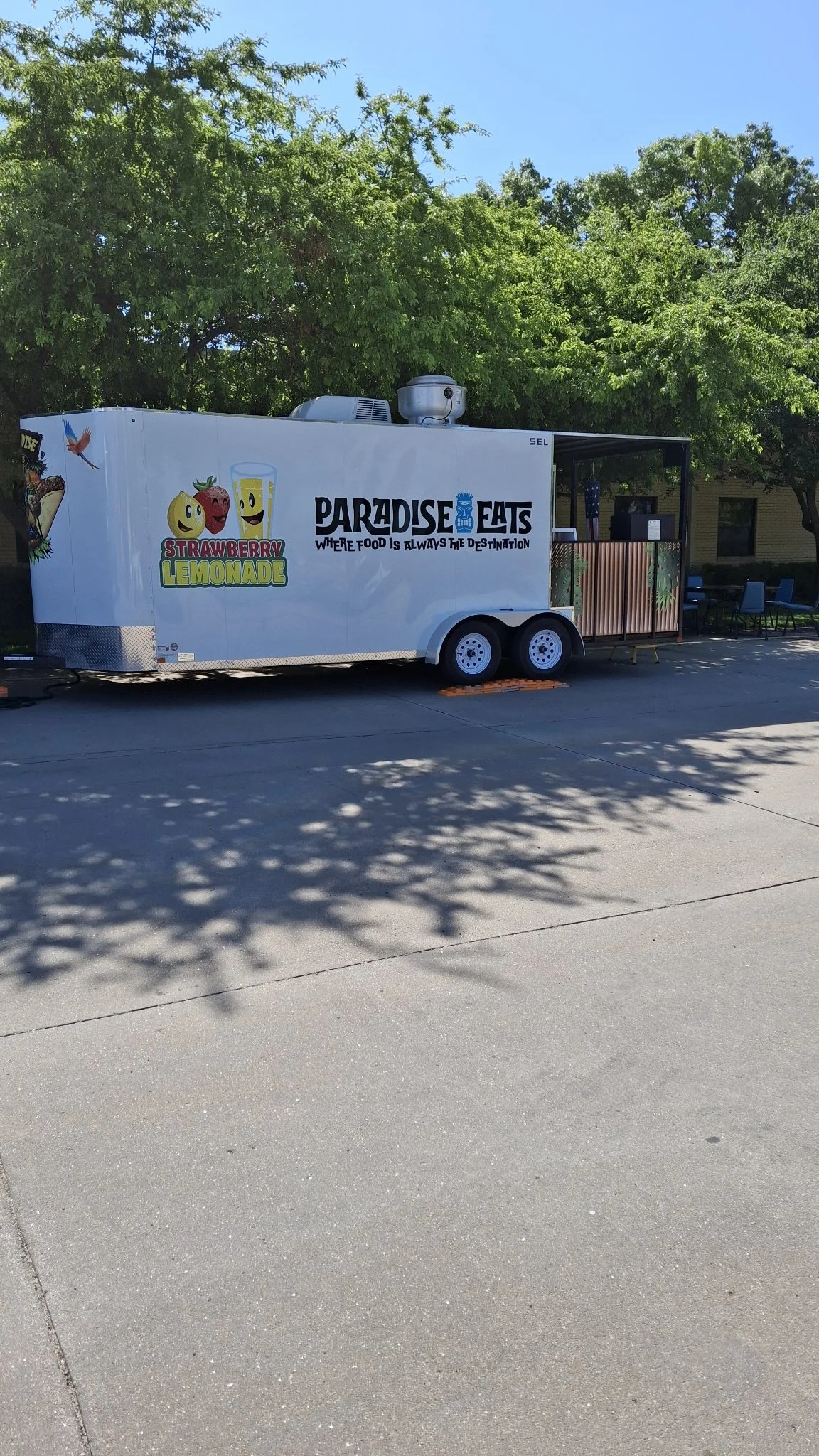 Paradise Eats food truck parked at an event