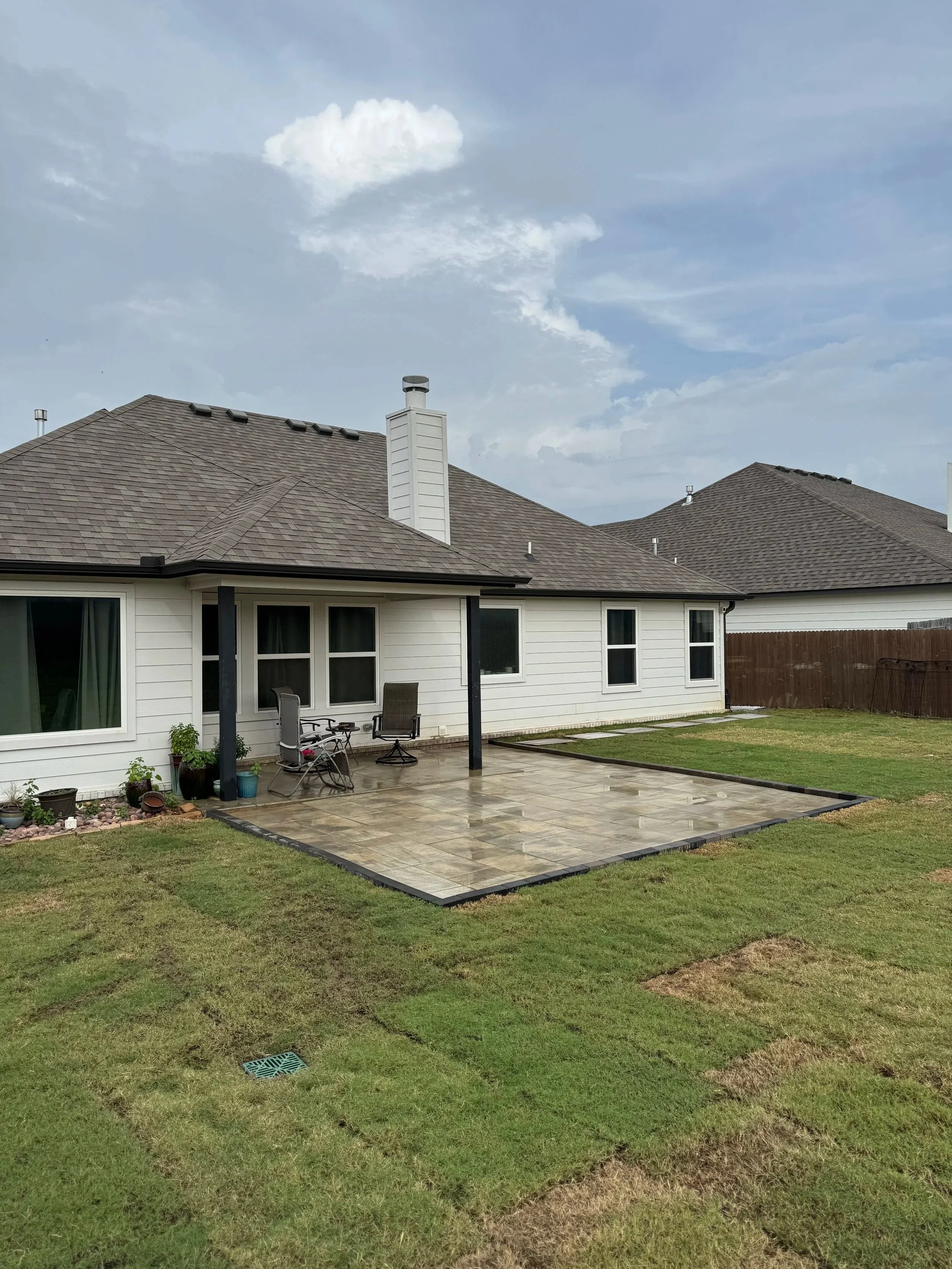 Paver patio, French drain, and sod installation