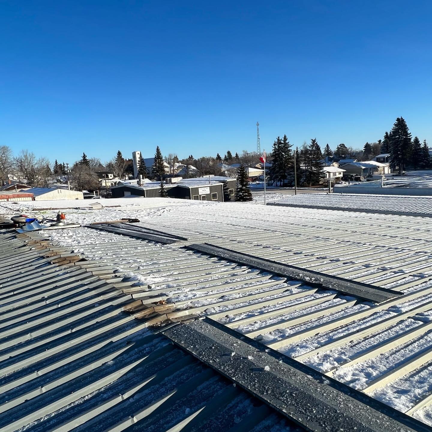 This was a nice little weekend project. this 35 year old steel roof. Was breaking down and leaking everywhere. so we replaced it with brand-new panels. Old roof was done in two pieces . We did it in One piece.And it  turned out awesome..