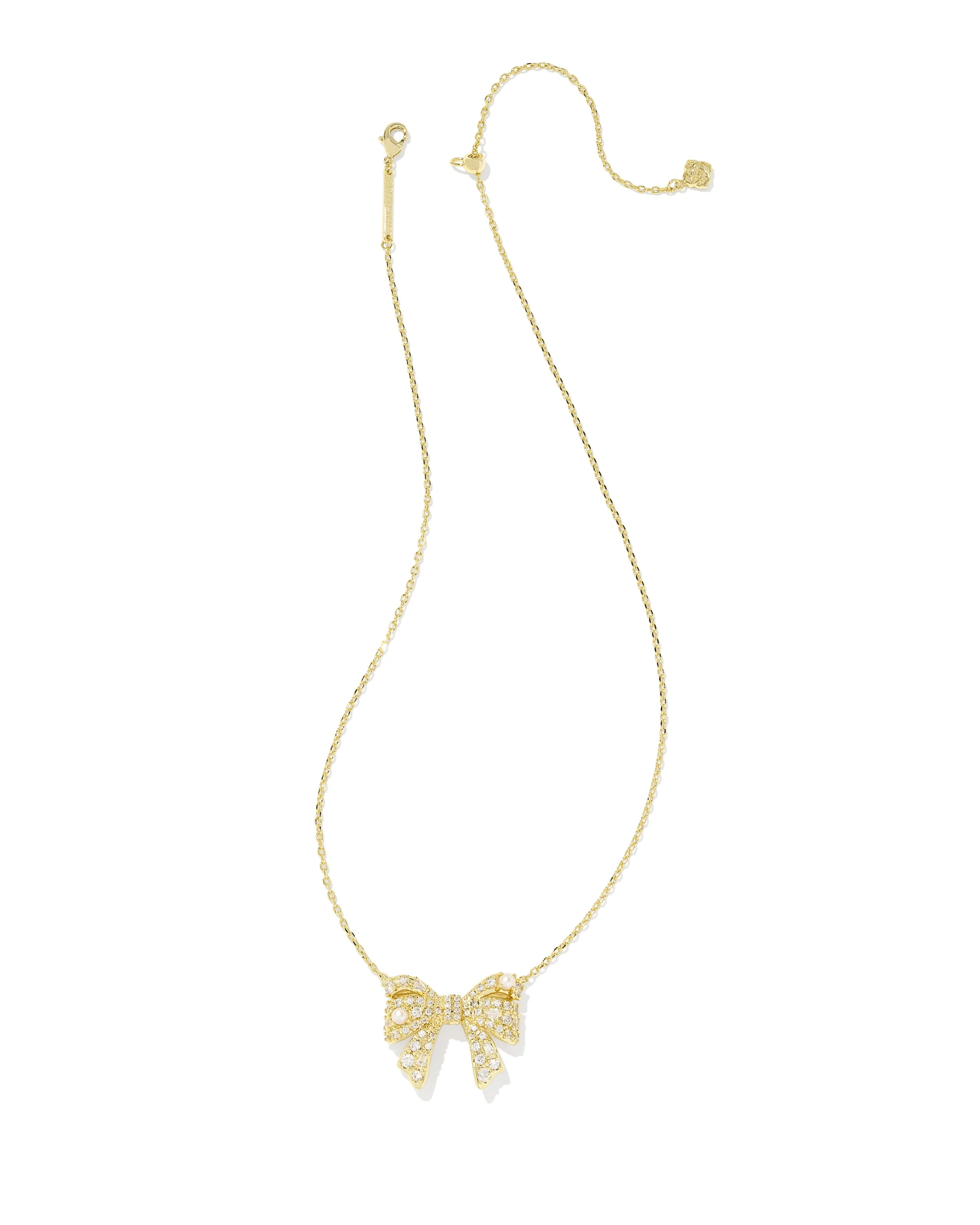 kendra-scott-krista-bow-short-pendant-necklace-gold-white-mix-01.jpg