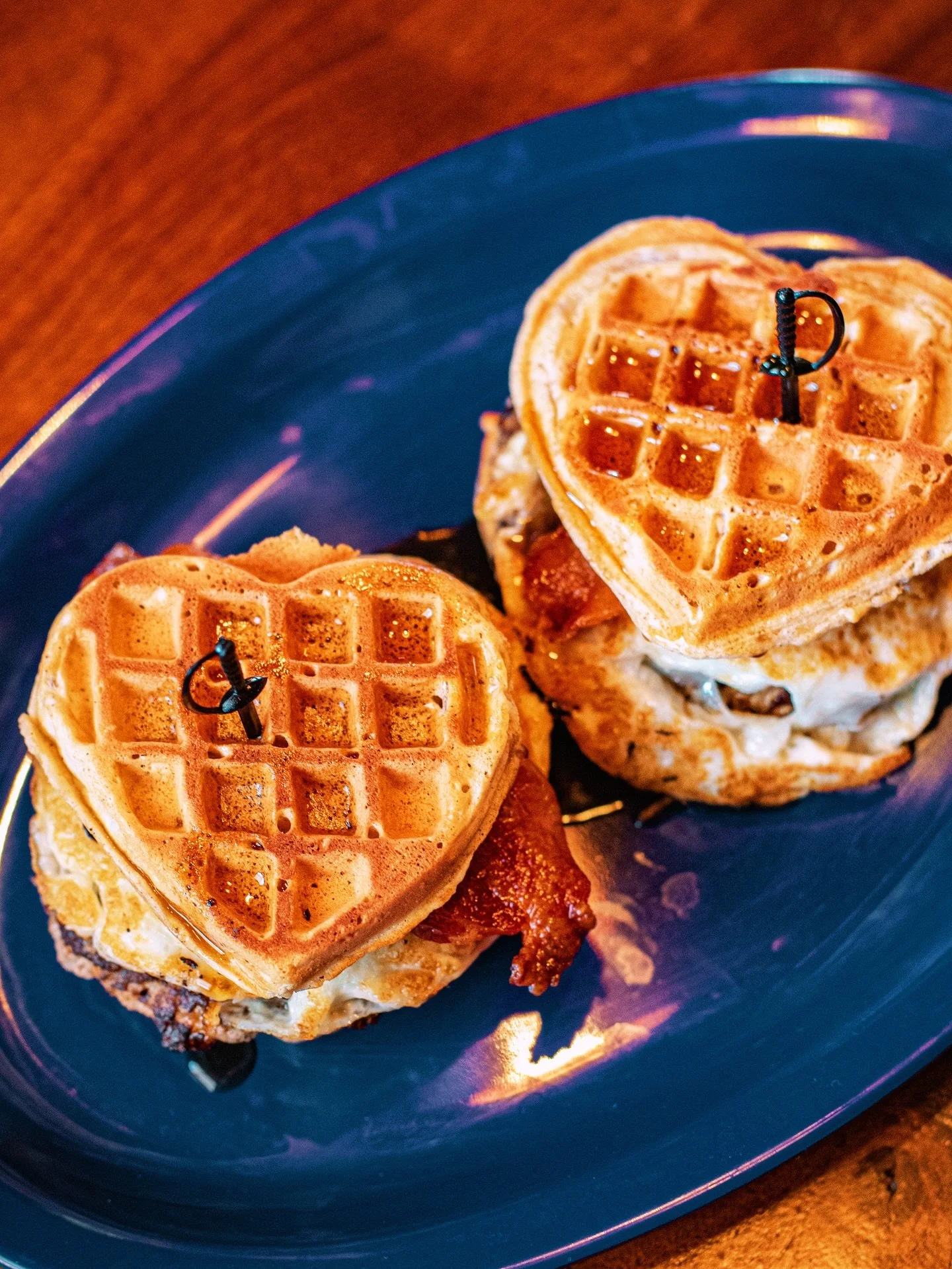 🧇 &hearts;️✨DIY at Busty&rsquo;s. Order waffles with a side of  eggs, bacon, or sausage and assemble yourself a beast of a brunch sandwich.✨&hearts;️🧇 Stick around after 5 for BOGO burgers and $1 High Life Ponies.✨
