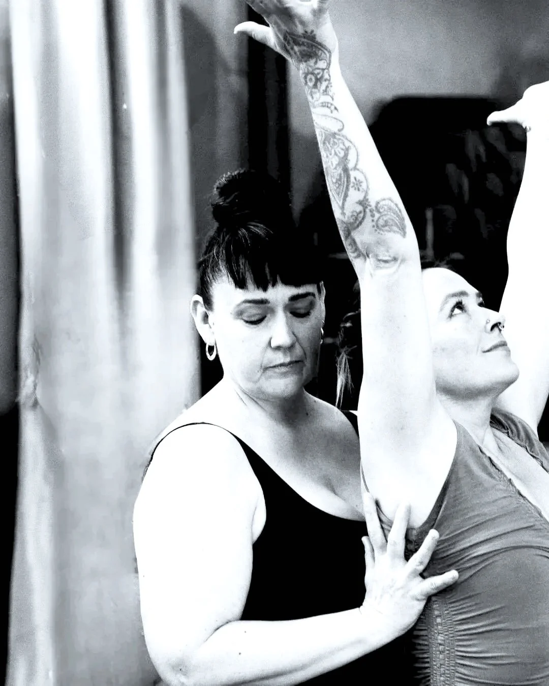 Two women in a Private Yoga session at Full Bodied Yoga in Portland, Oregon.
