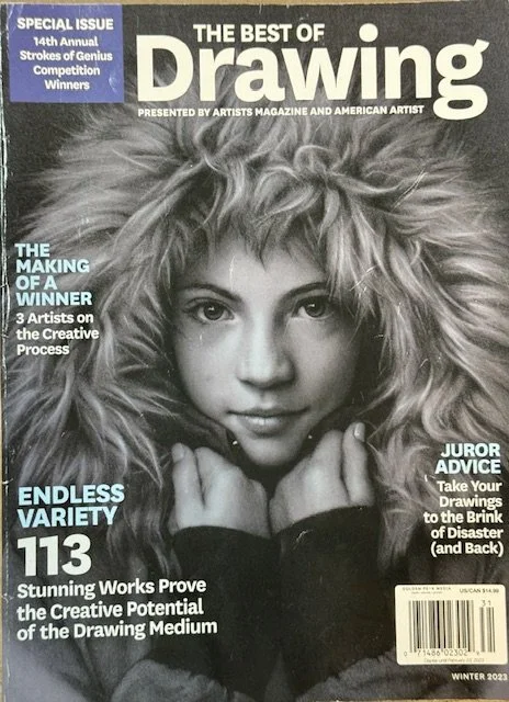 Magazine cover titled 'The Best of Drawing,' featuring an artistic portrait of a person with voluminous hair, wearing a cozy, high-neck outfit. Articles highlighted include topics on the creative process, artistic variety, and drawing advice. The cover mentions it is a special issue with competition winners, dated Winter 2023.