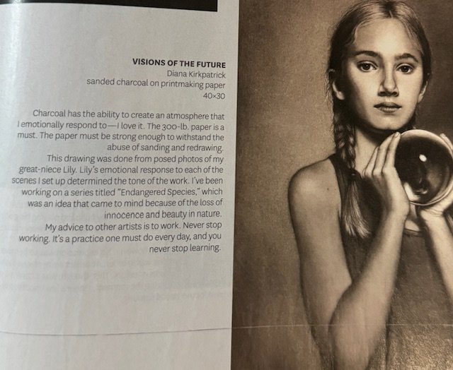 A magazine page featuring "Visions of the Future" by Diana Kirkpatrick, a sanded charcoal artwork on printmaking paper, depicting a young girl with long hair holding a spherical object. The text discusses the emotional impact of charcoal art and the artist's inspiration from her great-niece's expressions.
