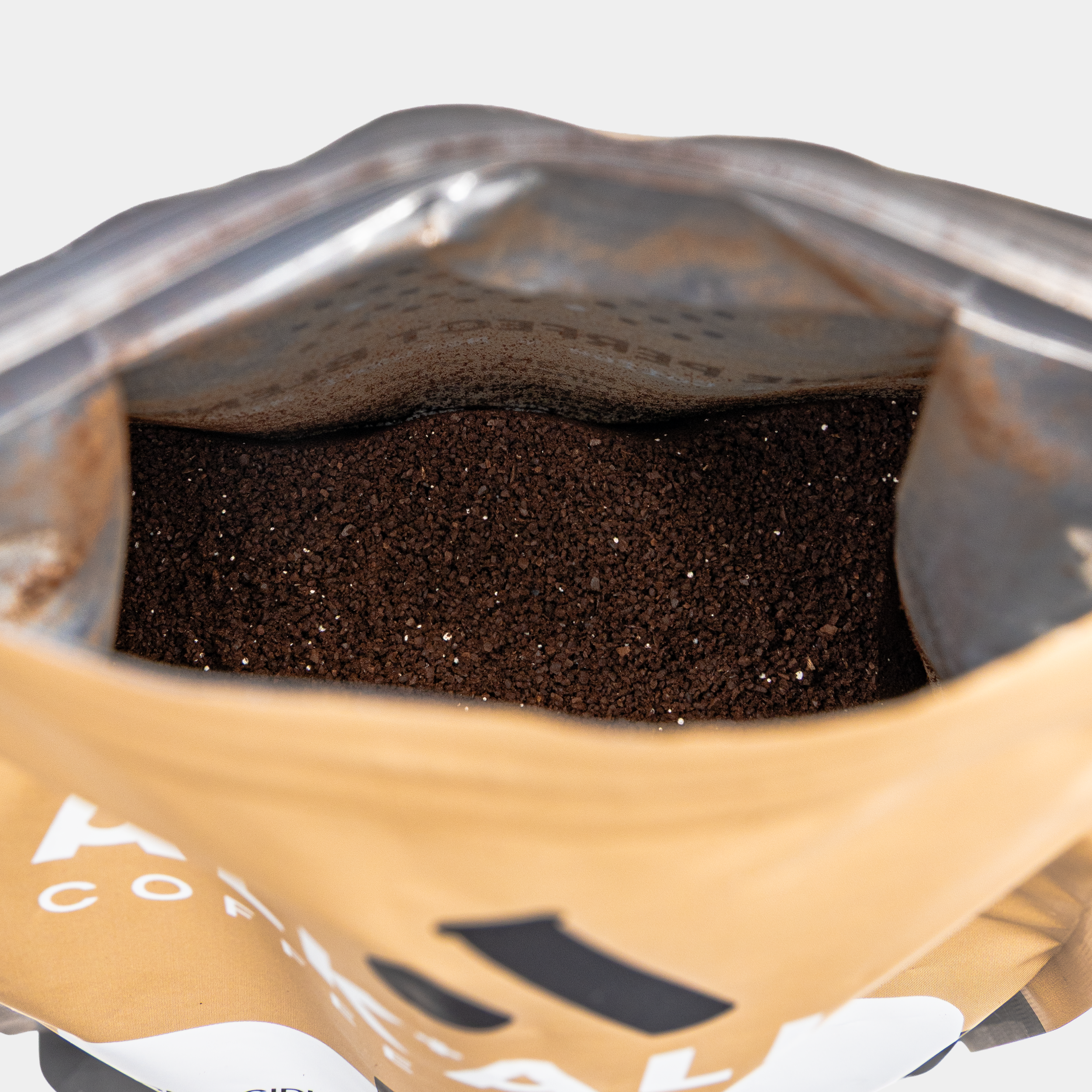 Alkaline 1x1 Crops_Bags_Bag Open.png