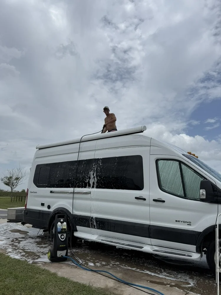 Russell washing the SEO Van (Brownsville, TX)
