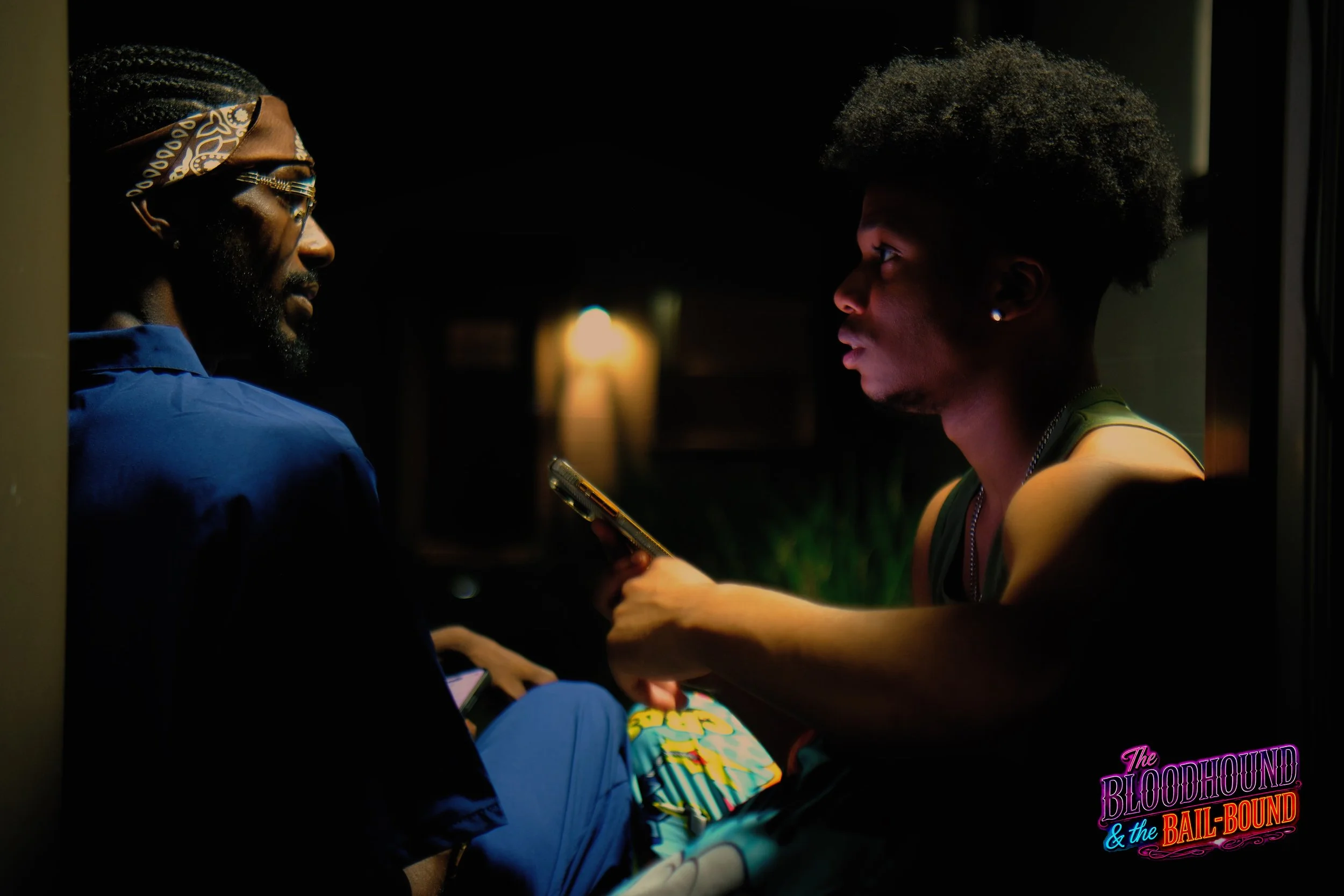 A frame from the original streaming TV series THE BLOODHOUND & THE BAIL-BOUND (2026) by Filmmaker Lazarus X.  © 2027 The Lazarus X Archives for Media, Rights & Masters LLC. All Rights Reserved.