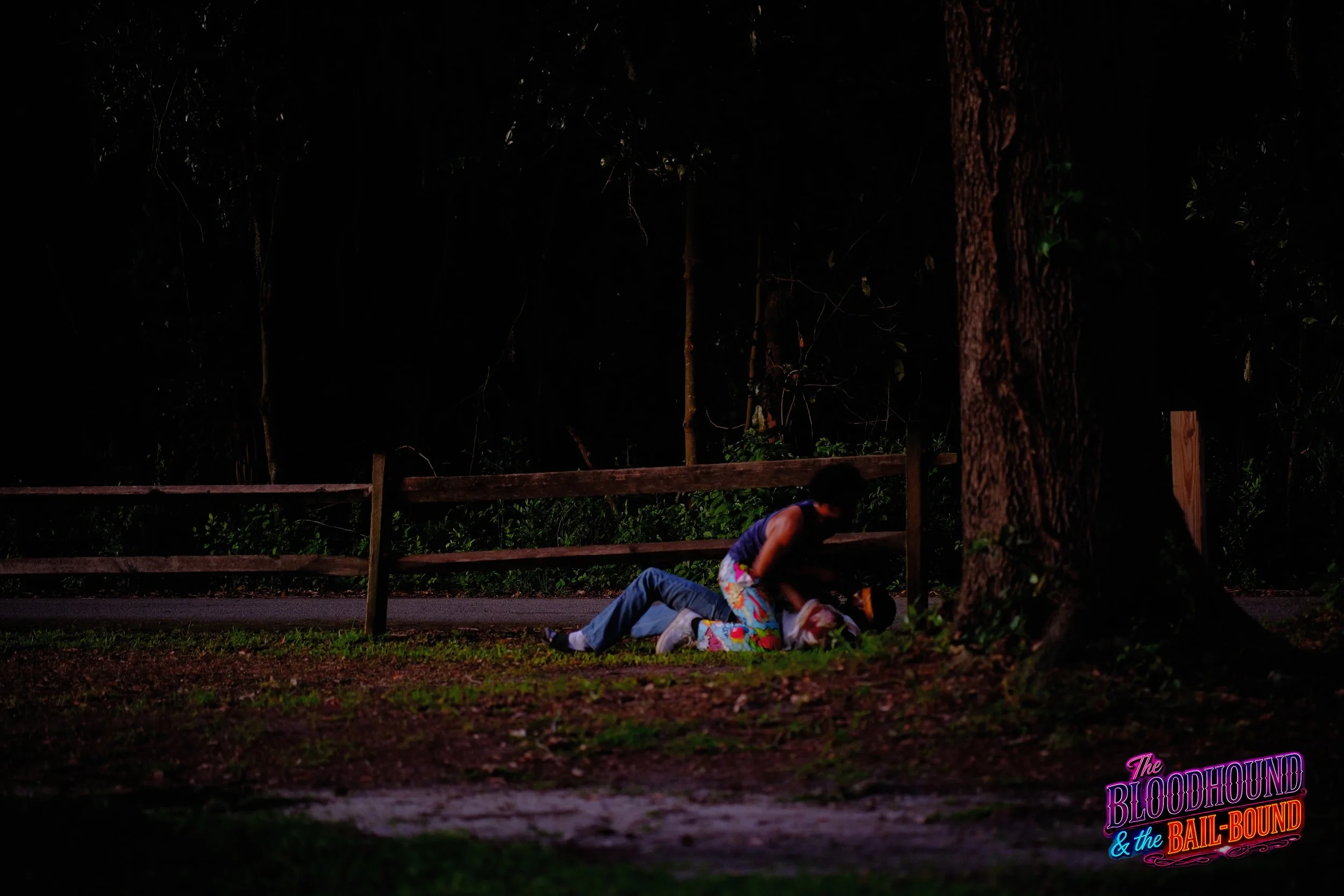 A frame from the original streaming TV series THE BLOODHOUND & THE BAIL-BOUND (2026) by Filmmaker Lazarus X.  © 2027 The Lazarus X Archives for Media, Rights & Masters LLC. All Rights Reserved.