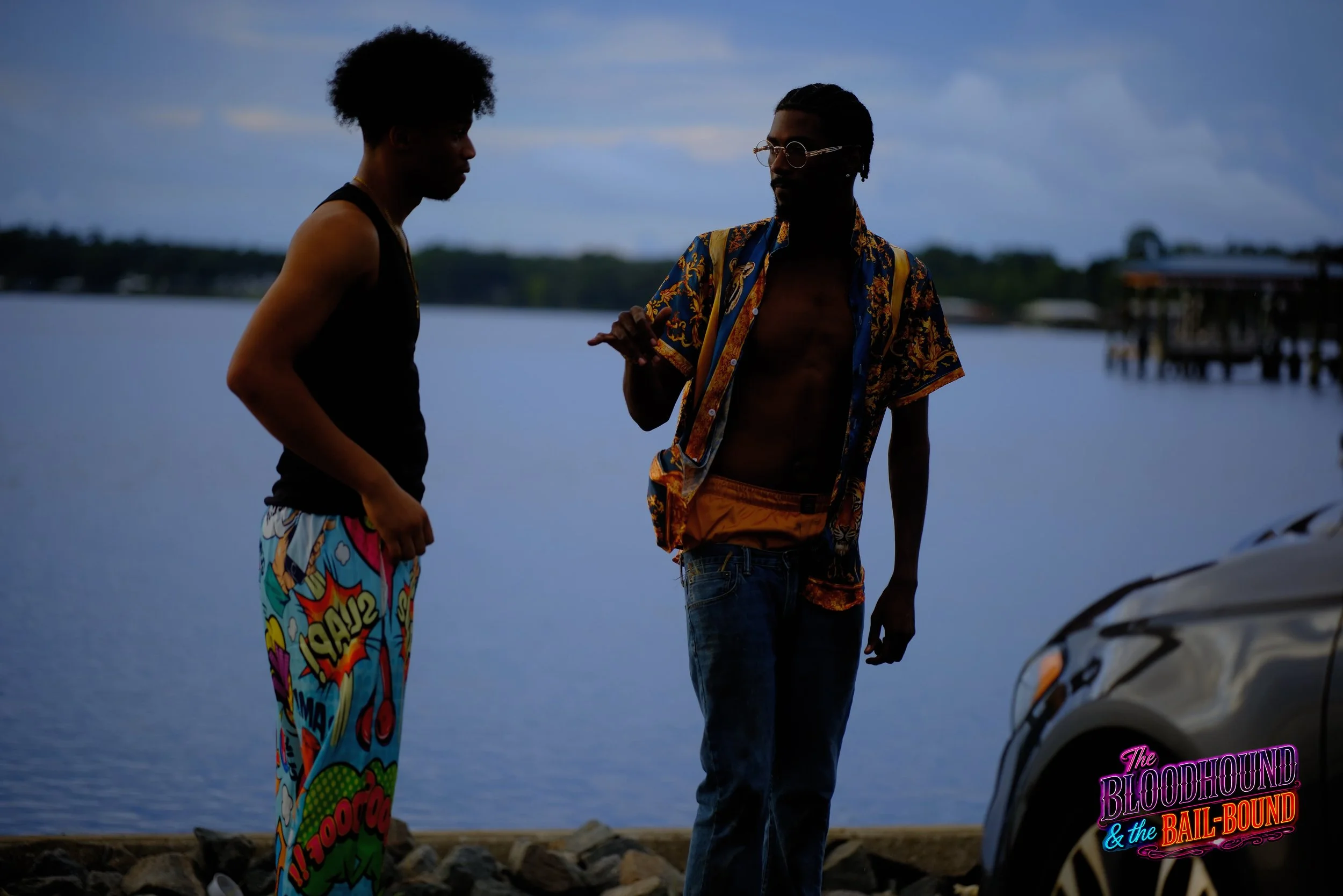 A frame from the original streaming TV series THE BLOODHOUND & THE BAIL-BOUND (2026) by Filmmaker Lazarus X.  © 2027 The Lazarus X Archives for Media, Rights & Masters LLC. All Rights Reserved.