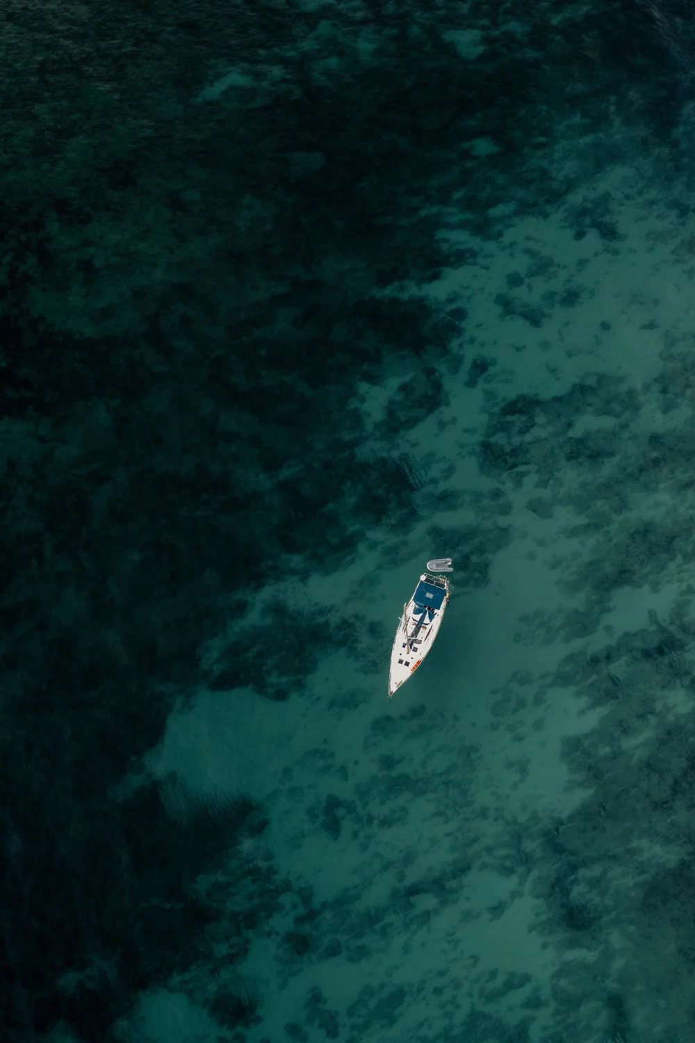 Boat in the sea near Mallorca seen from above