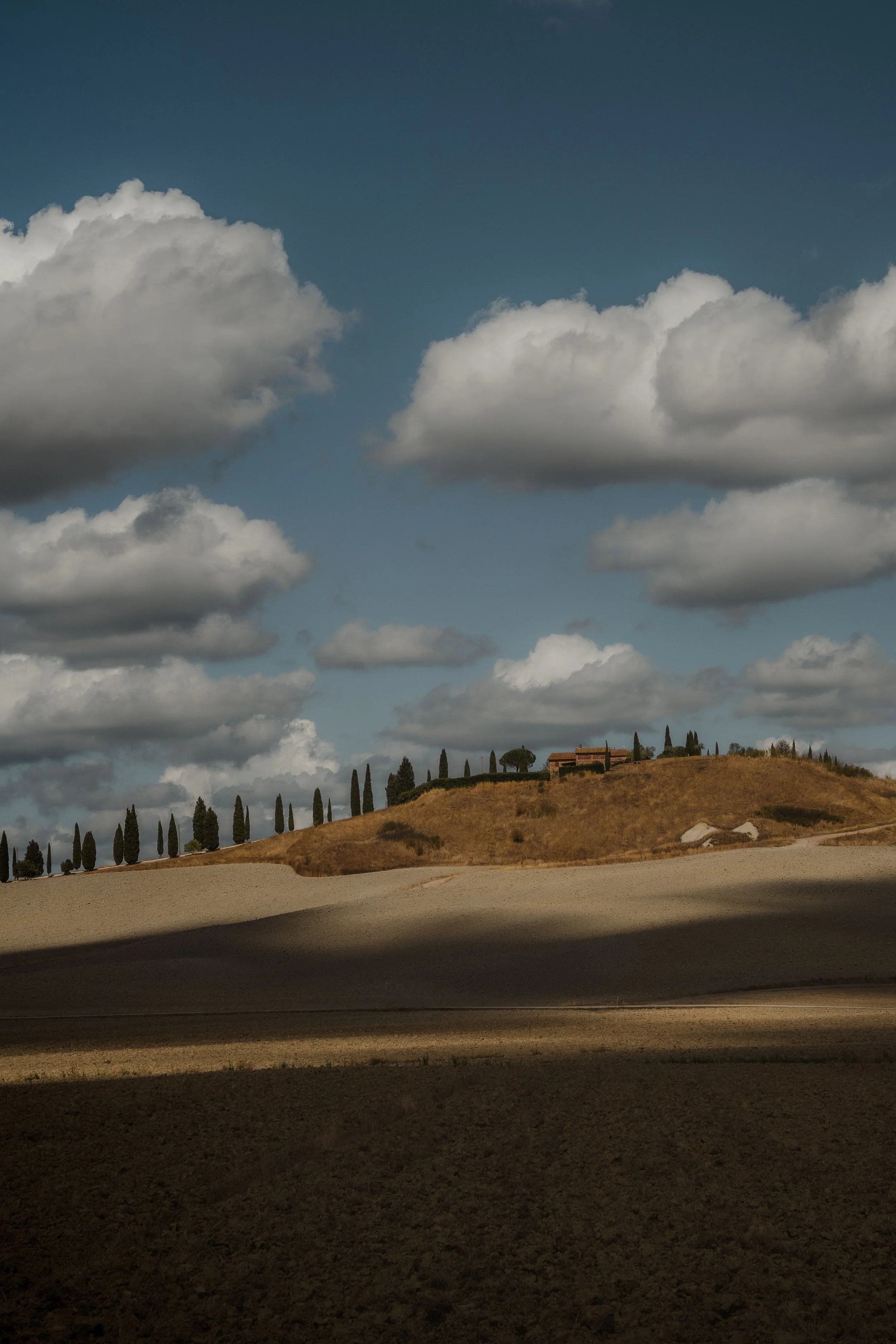 tuscany-hills-clouds.jpg